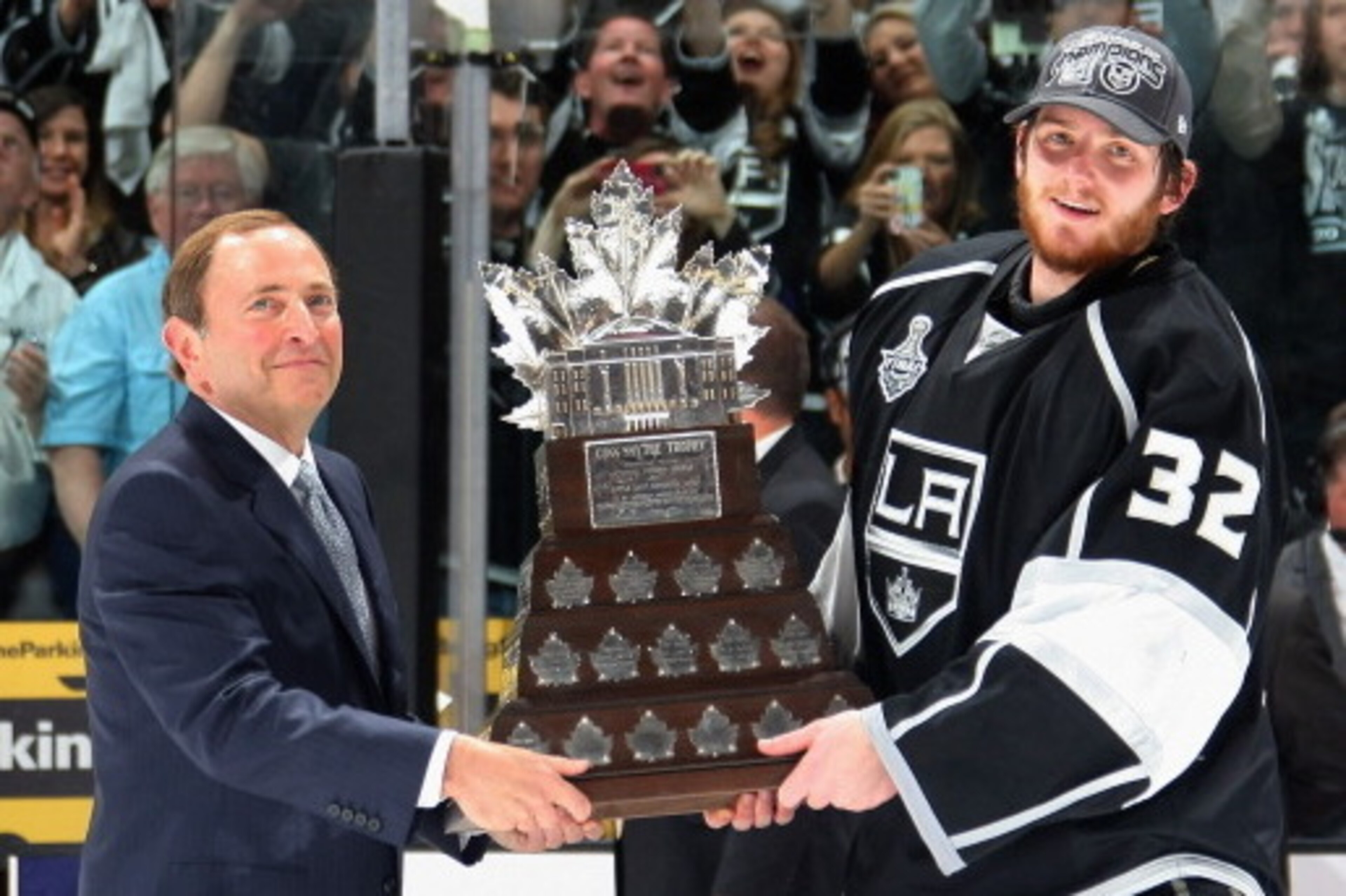 LOS ANGELES, CA - JUNE 11:  Goaltender Jonathan Quick #32 of the Los Angeles Kings (R) is presented the Conn Smythe award from NHL commissioner Gary Bettman (L) after the Los Angeles Kings defeated the New Jersey Devils 6-1 in Game Six of the 2012 Stanley