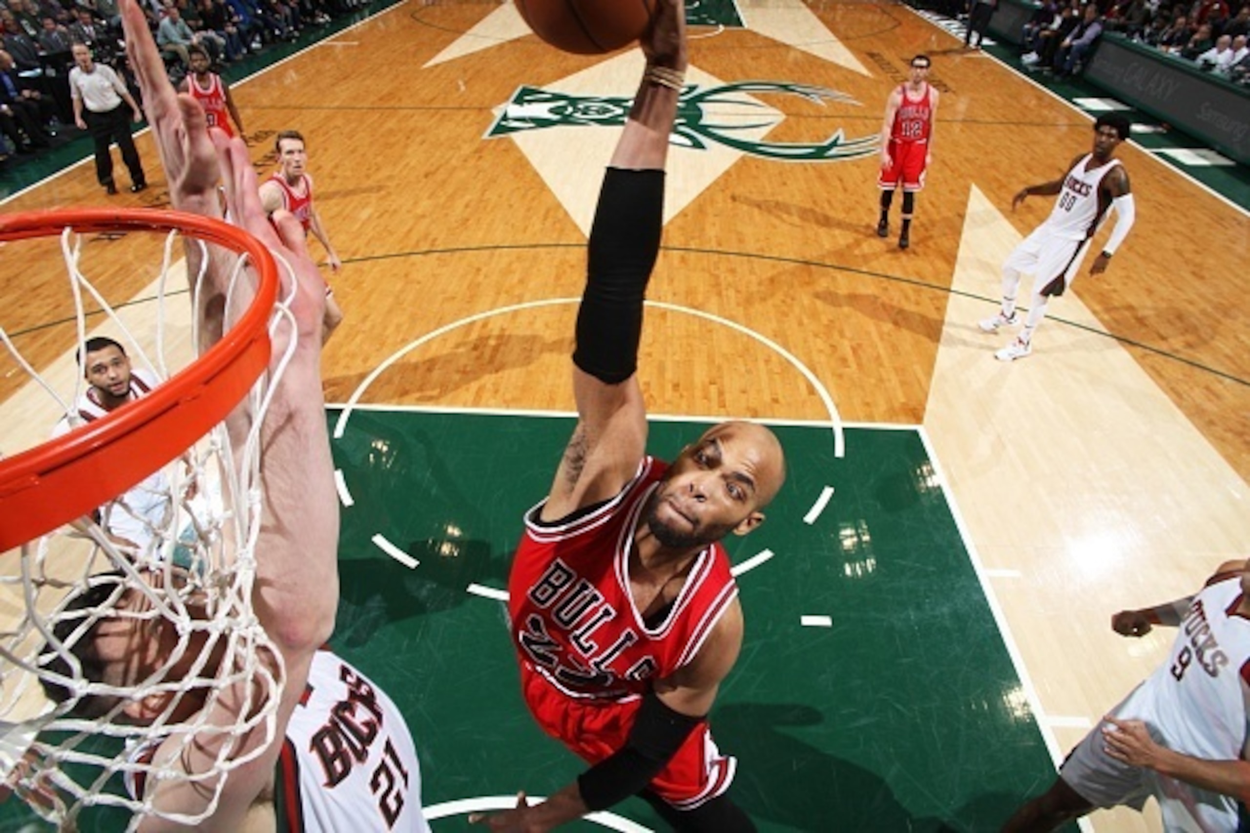 MILWAUKEE, WI - APRIL 30: Taj Gibson #22 of the Chicago Bulls dunks against the Milwaukee Bucks in Game Six of the Eastern Conference Quarterfinals of the 2015 NBA Playoffs on April 30, 2015 at BMO Harris Bradley Center in Milwaukee, Wisconsin. NOTE TO US