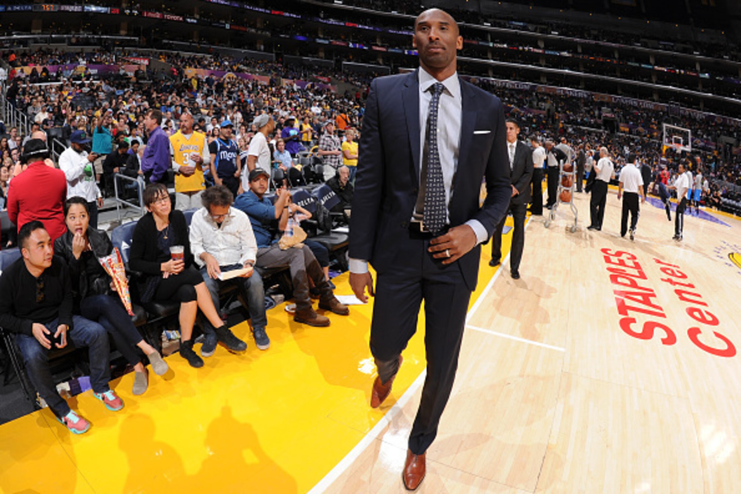 LOS ANGELES, CA - APRIL 12: Kobe Bryant #24 of the Los Angeles Lakers stands on the court during a game against the Dallas Mavericks at STAPLES Center on April 12, 2015 in Los Angeles, California. NOTE TO USER: User expressly acknowledges and agrees that,