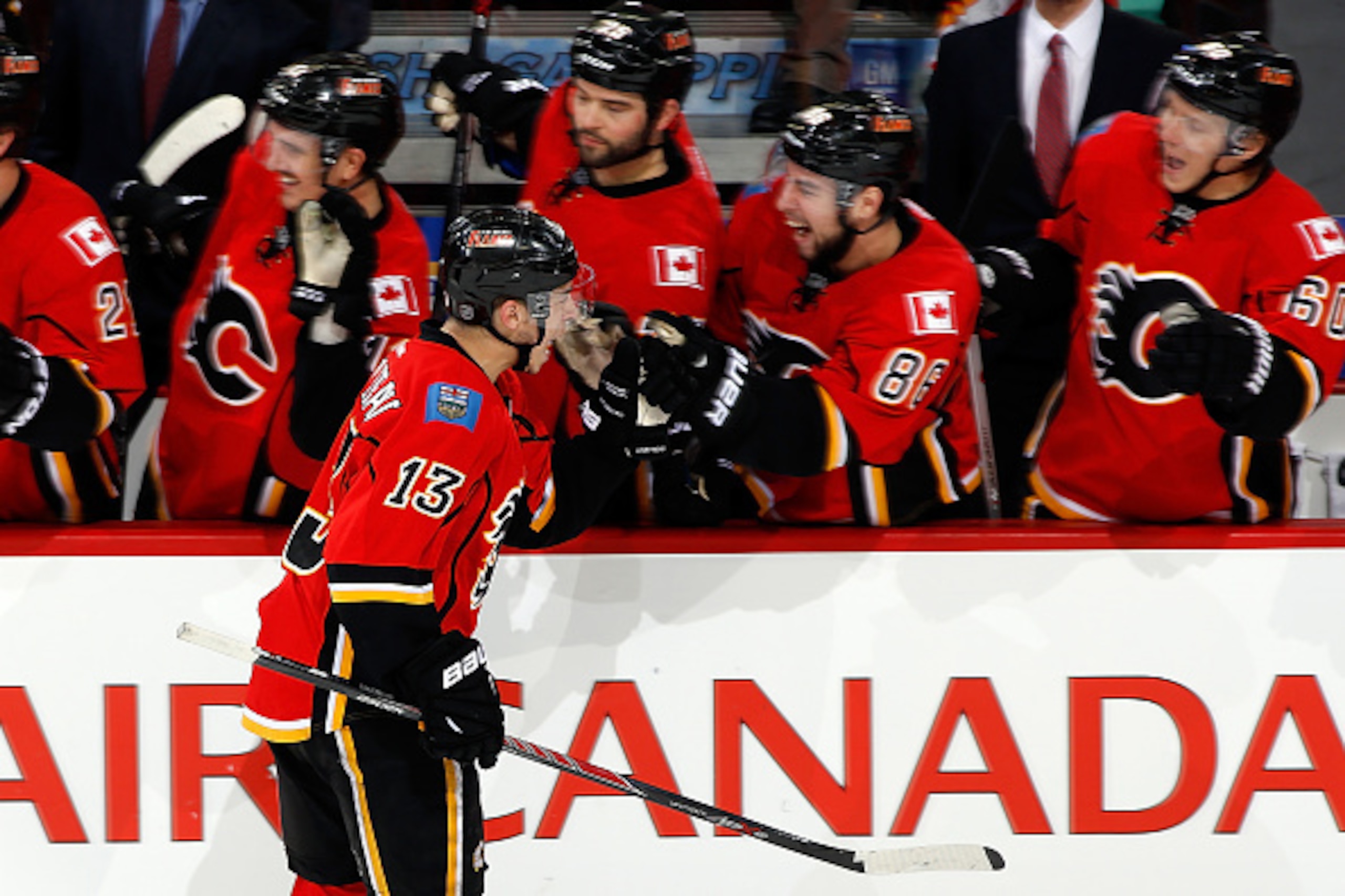 CALGARY, AB - MAY 5: Johnny Gaudreau #13 of the Calgary Flames celebrates a goal against the Anaheim Ducks at Scotiabank Saddledome for Game Three of the Western Quarterfinals during the 2015 NHL Stanley Cup Playoffs on May 5, 2015 in Calgary, Alberta, Ca
