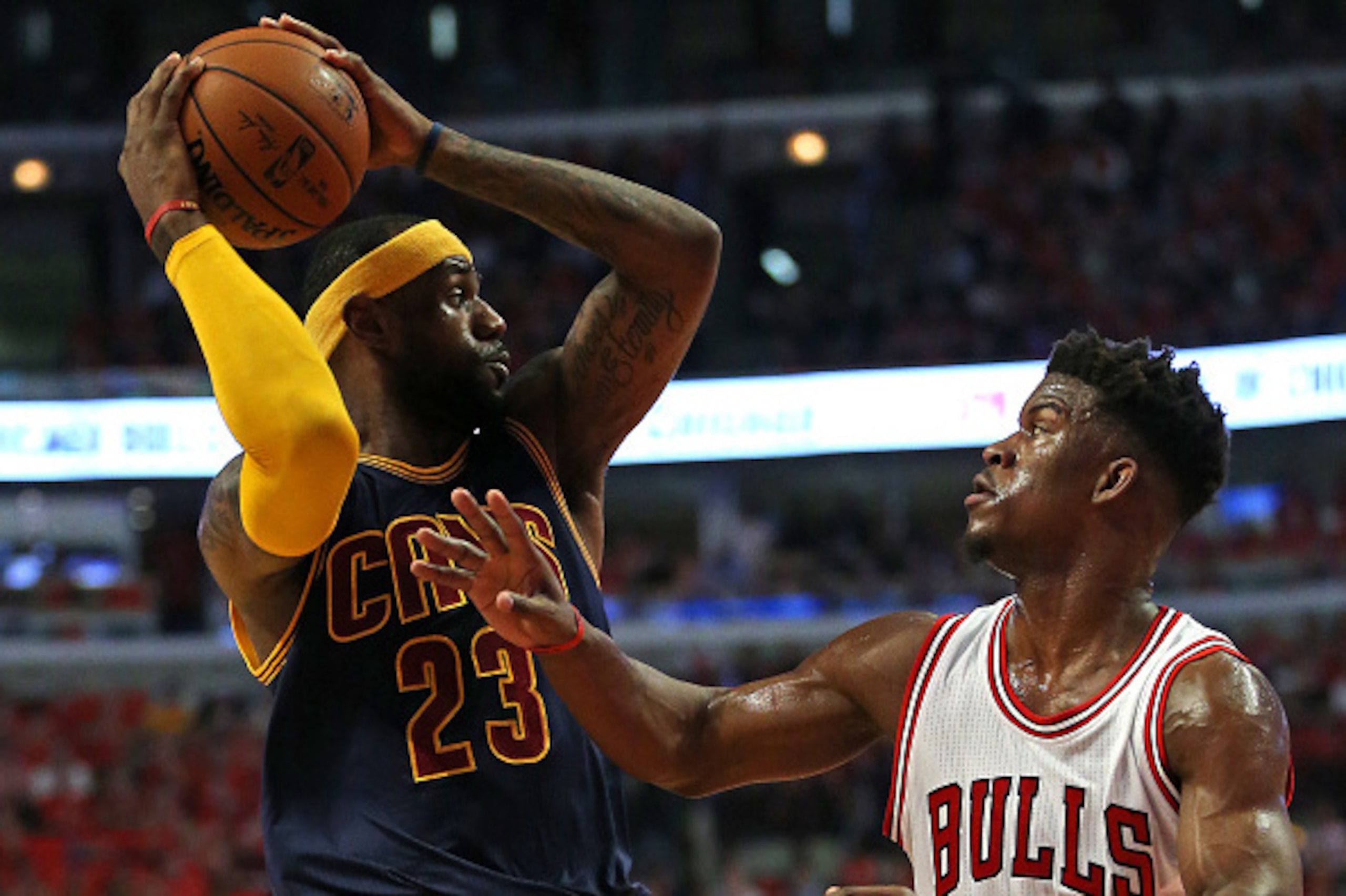 CHICAGO, IL - MAY 08: LeBron James #23 of the Cleveland Cavaliers looks to pass over Jimmy Butler #21 of the Chicago Bulls in Game Three of the Eastern Conference Semifinals of the 2015 NBA Playoffs at the United Center on May 8, 2015 in Chicago, Illinoi CHICAGO, IL - MAY 08: LeBron James #23 of the Cleveland Cavaliers looks to pass over Jimmy Butler #21 of the Chicago Bulls in Game Three of the Eastern Conference Semifinals of the 2015 NBA Playoffs at the United Center on May 8, 2015 in Chicago, Illinoi