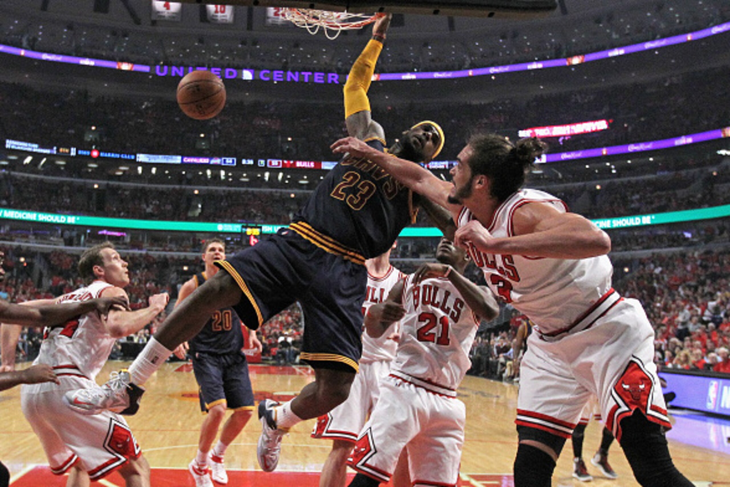 CHICAGO, IL - MAY 08: LeBron James #23 of the Cleveland Cavaliers dunks over (l-R) Mike Dunleavy #34, Jimmy Buter #21 and Joakim Noah #13 of the Chicago Bulls in Game Three of the Eastern Conference Semifinals of the 2015 NBA Playoffs at the United Center CHICAGO, IL - MAY 08: LeBron James #23 of the Cleveland Cavaliers dunks over (l-R) Mike Dunleavy #34, Jimmy Buter #21 and Joakim Noah #13 of the Chicago Bulls in Game Three of the Eastern Conference Semifinals of the 2015 NBA Playoffs at the United Center