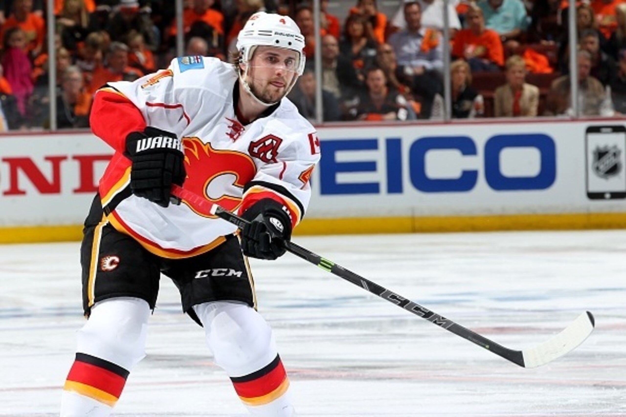 ANAHEIM, CA - APRIL 30: Kris Russell #4 of the Calgary Flames handles the puck against the Anaheim Ducks in Game One of the Western Conference Semifinals during the 2015 NHL Stanley Cup Playoffs at Honda Center on April 30, 2015 in Anaheim, California. (P ANAHEIM, CA - APRIL 30: Kris Russell #4 of the Calgary Flames handles the puck against the Anaheim Ducks in Game One of the Western Conference Semifinals during the 2015 NHL Stanley Cup Playoffs at Honda Center on April 30, 2015 in Anaheim, California. (P