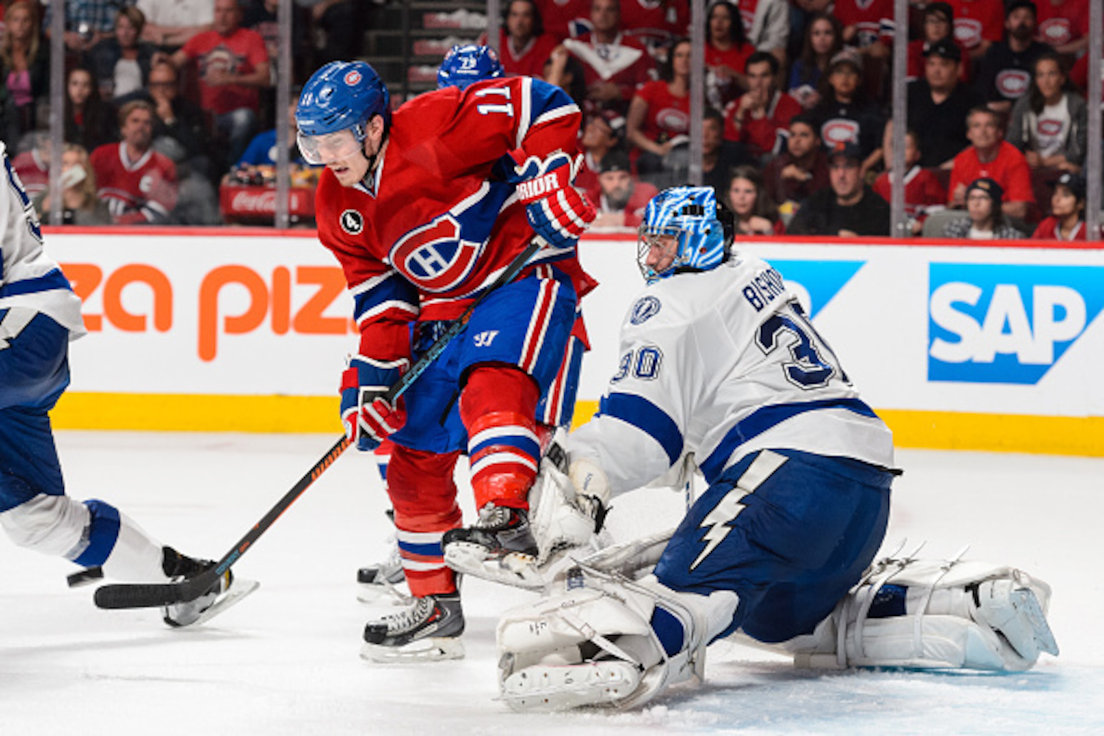 MONTREAL, QC - MAY 09:  Brendan Gallagher #11 of the Montreal Canadiens tries to redirect a shot in front of goaltender Ben Bishop #30 of the Tampa Bay Lightning in Game Five of the Eastern Conference Semifinals during the 2015 NHL Stanley Cup Playoffs at