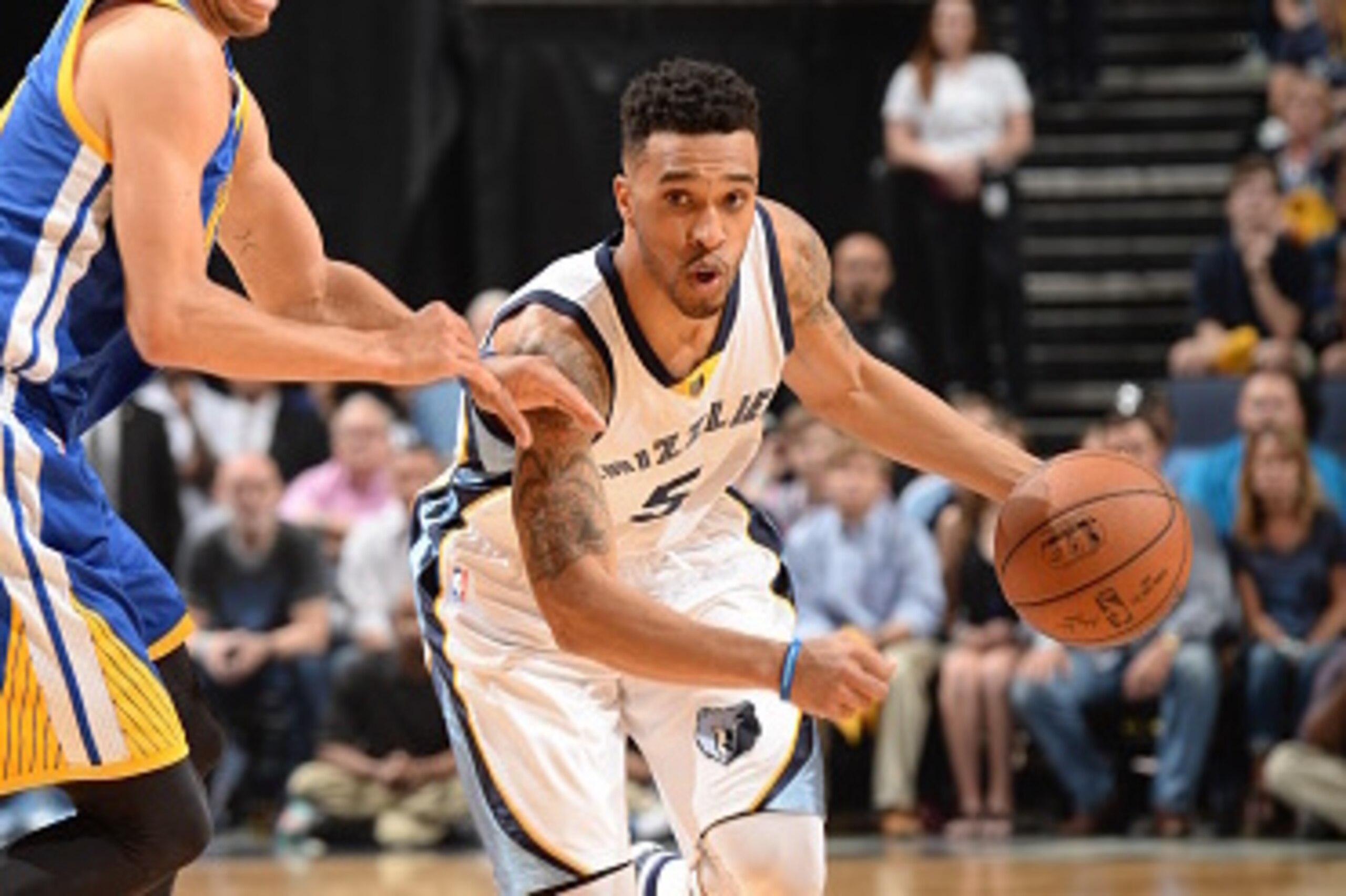 MEMPHIS, TN - MAY 9:  Courtney Lee #5 of the Memphis Grizzlies drives to the basket against Stephen Curry #30 of the Golden State Warriors in Game Three of the Western Conference Semifinals during the 2015 NBA Playoffs on May 9, 2015 at the FedExForum in 