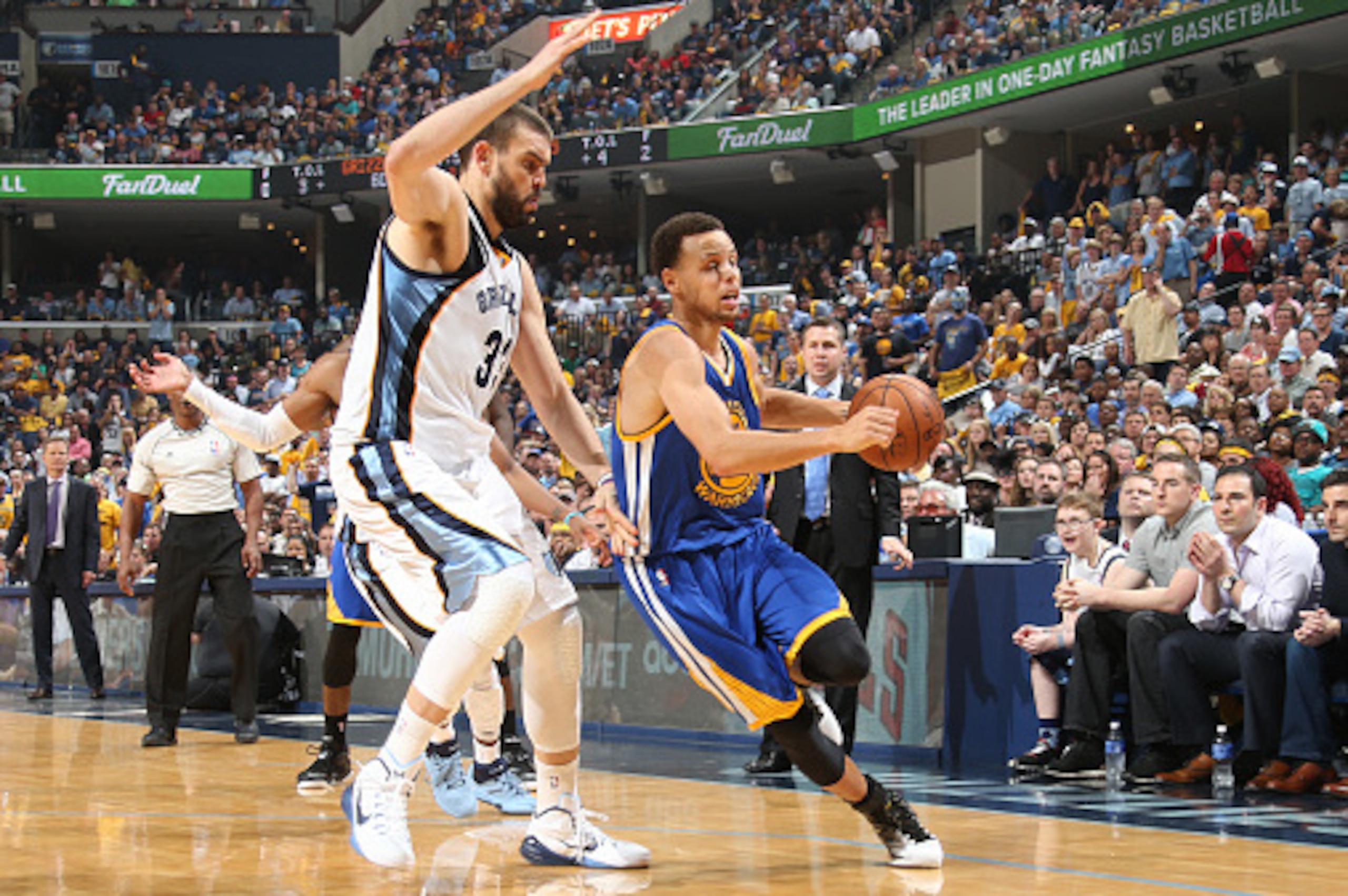MEMPHIS, TN - MAY 9: Stephen Curry #30 of the Golden State Warriors drives against Marc Gasol #33 of the Memphis Grizzlies during Game Three of the Western Conference Semifinals of the NBA Playoffs on May 9, 2015 at FedExForum in Memphis, Tennessee.  NOTE