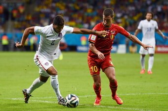 SALVADOR, BRAZIL - JULY 01: DeAndre Yedlin of the United States controls the ball against Eden Hazard of Belgium during the 2014 FIFA World Cup Brazil Round of 16 match between Belgium and the United States at Arena Fonte Nova on July 1, 2014 in Salvador,