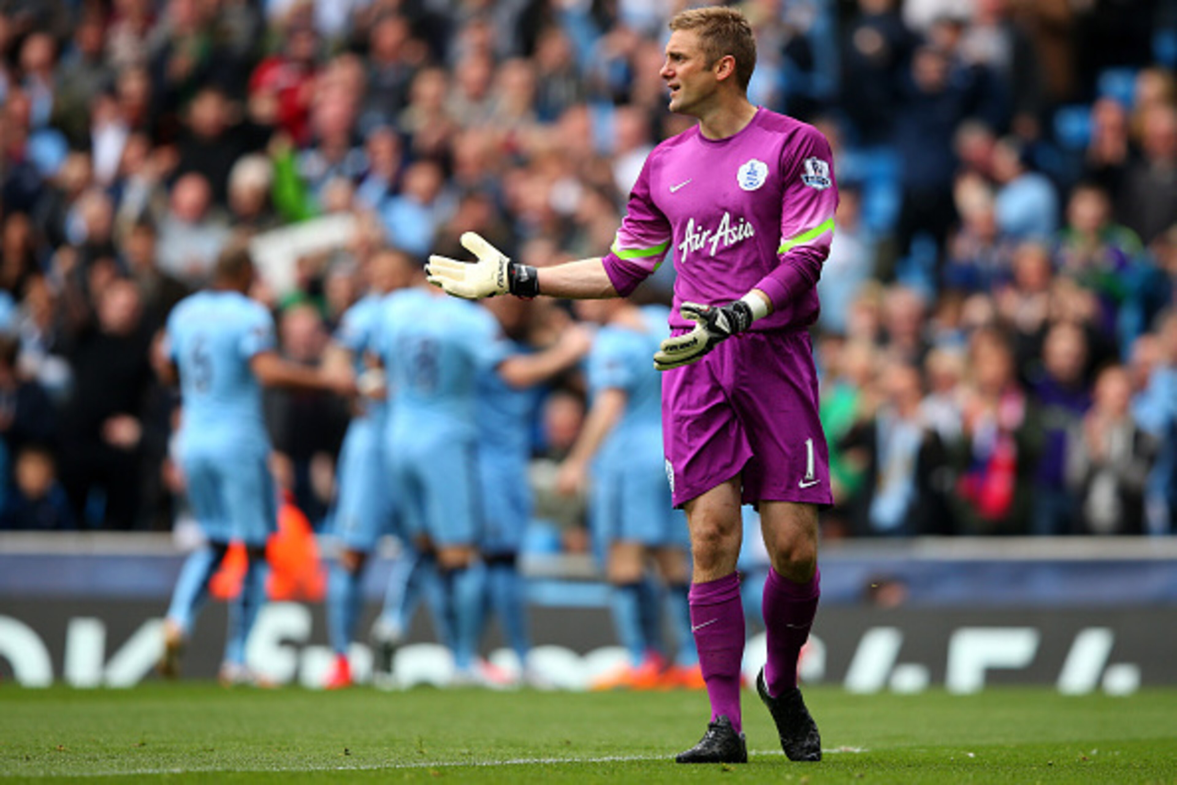 MANCHESTER, ENGLAND - MAY 10:  Dejected goalkeeper Robert Green of QPR reacts after conceding the opeing goal to Sergio Aguero of Manchester City during the Barclays Premier League match between Manchester City and Queens Park Rangers at the Etihad Stadiu