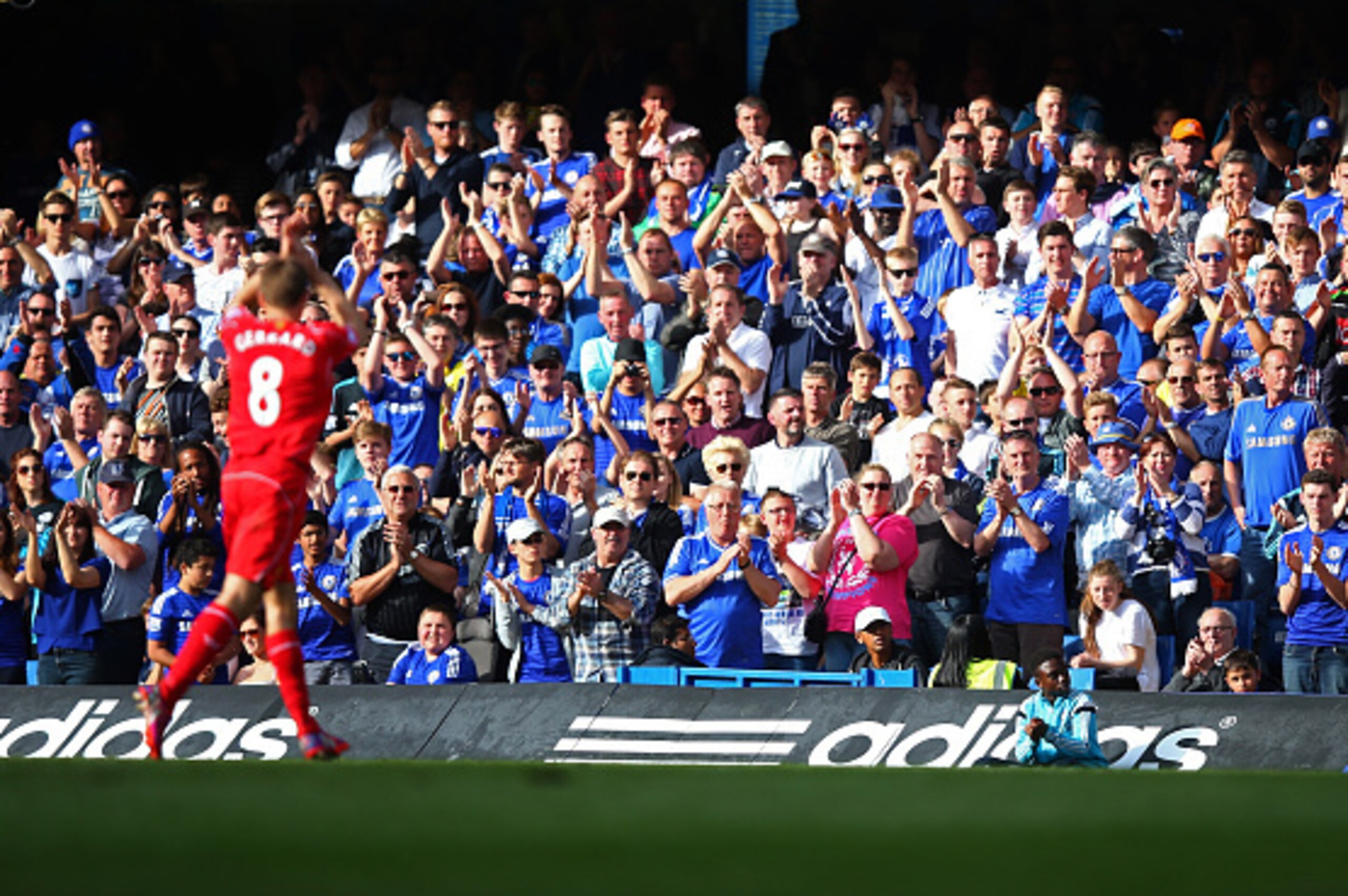 LONDON, ENGLAND - MAY 10: Chelsea fans give a standing ovation to Steven Gerrard of Liverpool as he leaves the pitch at Stamford Bridge for the final time during the Barclays Premier League match between Chelsea and Liverpool at Stamford Bridge on May 10 LONDON, ENGLAND - MAY 10: Chelsea fans give a standing ovation to Steven Gerrard of Liverpool as he leaves the pitch at Stamford Bridge for the final time during the Barclays Premier League match between Chelsea and Liverpool at Stamford Bridge on May 10