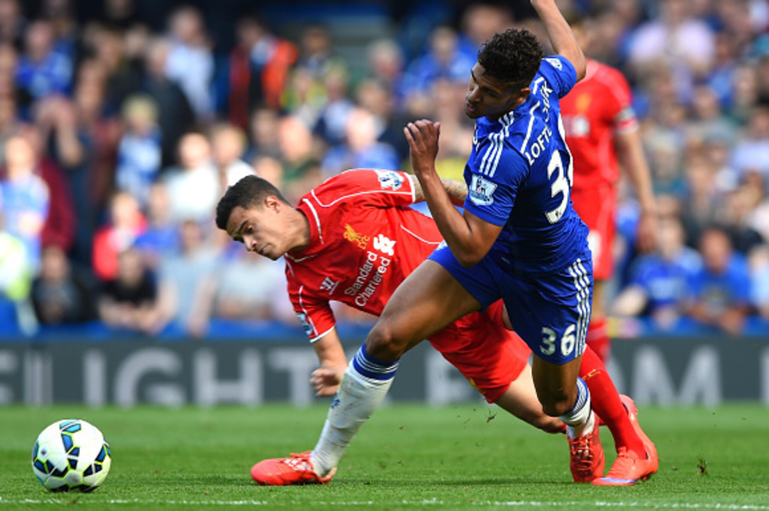 LONDON, ENGLAND - MAY 10:  Ruben Loftus-Cheek of Chelsea collides with Philippe Coutinho of Liverpool during the Barclays Premier League match between Chelsea and Liverpool at Stamford Bridge on May 10, 2015 in London, England.  (Photo by Shaun Botterill/