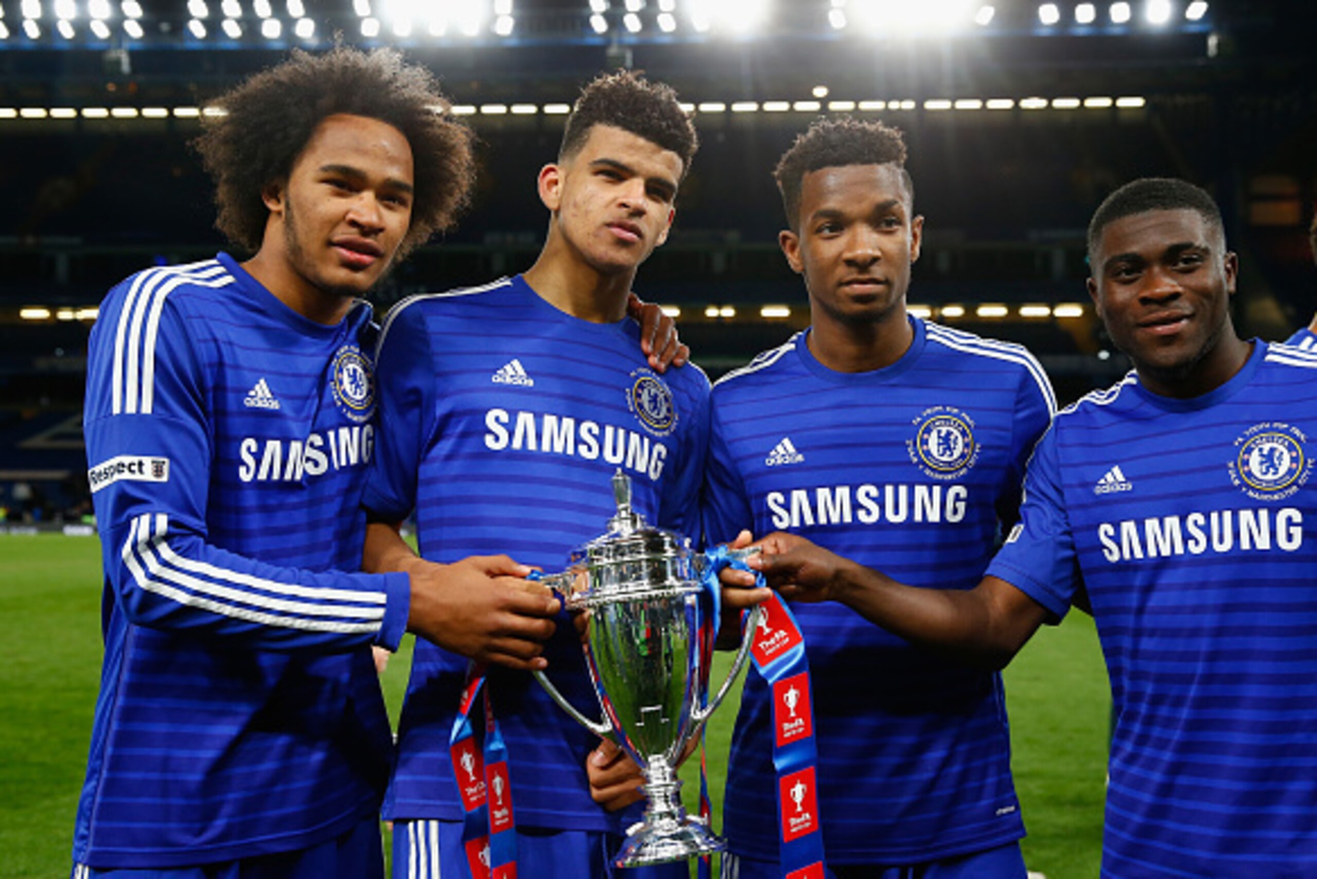 LONDON, ENGLAND - APRIL 27:  (L-R) Isaiah Brown, Dominic Solanke, Kasey Palmer and Jeremie Boga of Chelsea with the winners trophy during the FA Youth Cup Final second leg match between Chelsea and Manchester City at Stamford Bridge on April 27, 2015 in L