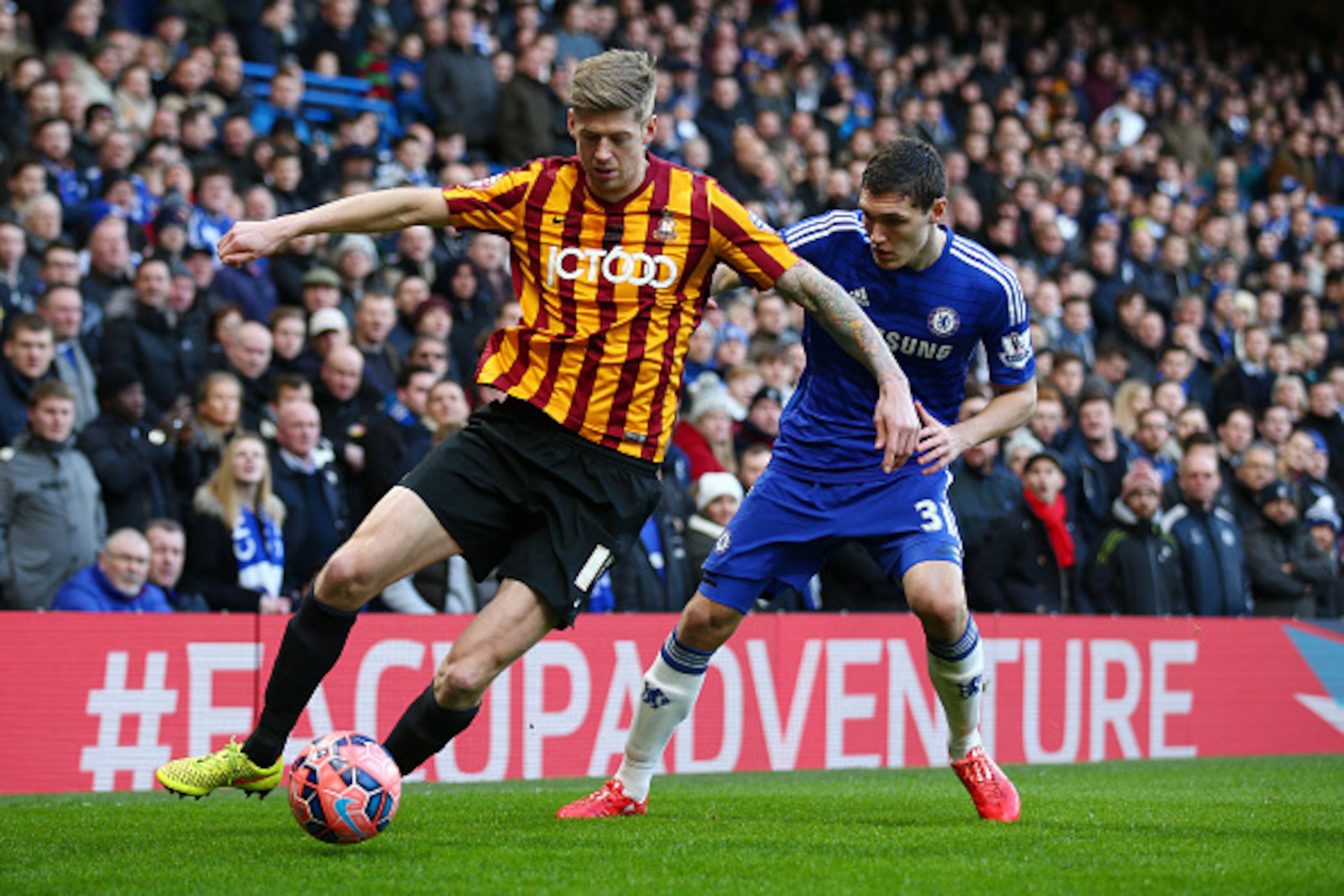LONDON, ENGLAND - JANUARY 24: Lewis Clarkson of Bradford City controls the ball under pressure from Andreas Christensen of Chelsea during the FA Cup Fourth Round match between Chelsea and Bradford City at Stamford Bridge on January 24, 2015 in London, En LONDON, ENGLAND - JANUARY 24: Lewis Clarkson of Bradford City controls the ball under pressure from Andreas Christensen of Chelsea during the FA Cup Fourth Round match between Chelsea and Bradford City at Stamford Bridge on January 24, 2015 in London, En