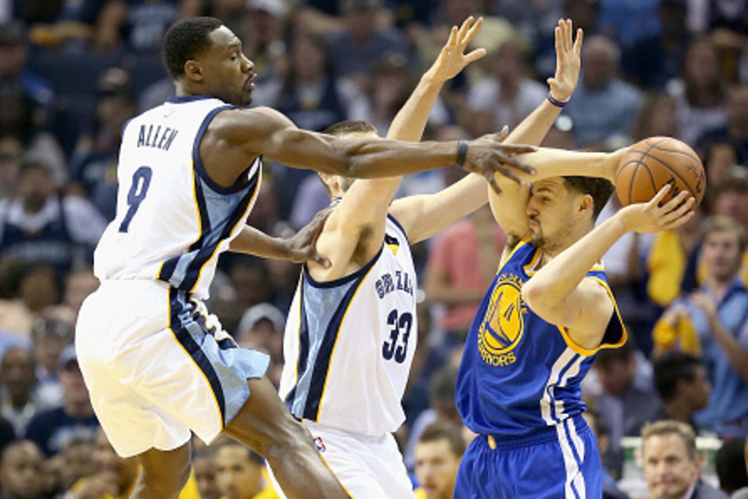 MEMPHIS, TN - MAY 09:  Tony Allen #9 and Marc Gasol #33 of the Memphis Grizzlies defend Klay Thompson #11 of the Golden State Warriors during Game three of the Western Conference Semifinals of the 2015 NBA Playoffs at FedExForum on May 9, 2015 in Memphis,
