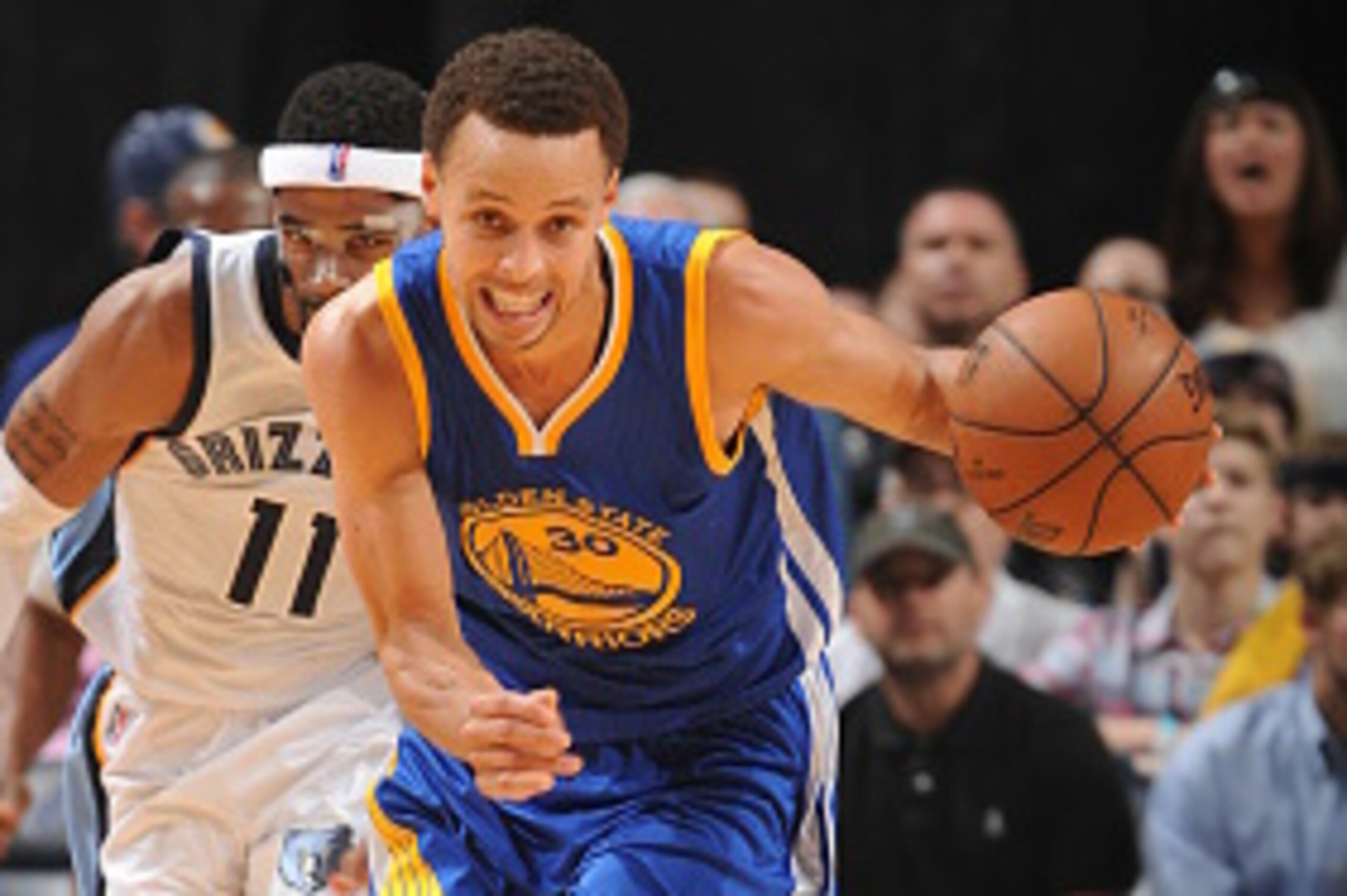 MEMPHIS, TN - MAY 9:  Stephen Curry #30 of the Golden State Warriors drives to the basket against the Memphis Grizzlies in Game Three of the Western Conference Semifinals during the 2015 NBA Playoffs on May 9, 2015 at the FedExForum in Memphis, Tennessee.