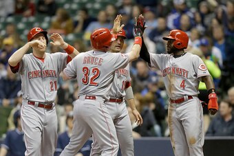 MILWAUKEE, WI - APRIL 21: Jay Bruce #32 of the Cincinnati Reds celebrates with Todd Frazier #21, Joey Votto #19 and Brandon Phillips #4 after hitting a grand slam in the third inning against the Milwaukee Brewers at Miller Park on April 21, 2015 in Milwau MILWAUKEE, WI - APRIL 21: Jay Bruce #32 of the Cincinnati Reds celebrates with Todd Frazier #21, Joey Votto #19 and Brandon Phillips #4 after hitting a grand slam in the third inning against the Milwaukee Brewers at Miller Park on April 21, 2015 in Milwau