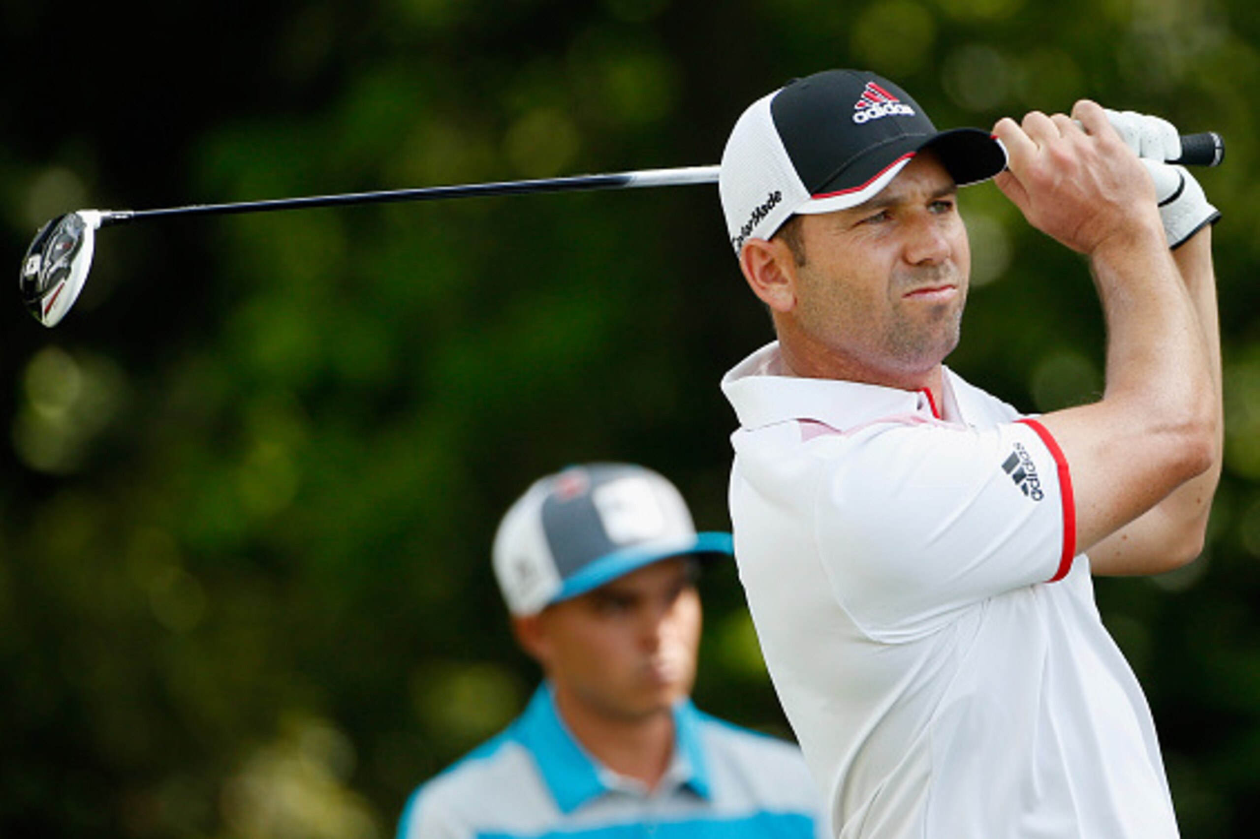 AUGUSTA, GA - APRIL 10:  Sergio Garcia of Spain  watches his tee shot on the second hole as Rickie Fowler of the United States looks on during the second round of the 2015 Masters Tournament at Augusta National Golf Club on April 10, 2015 in Augusta, Geor