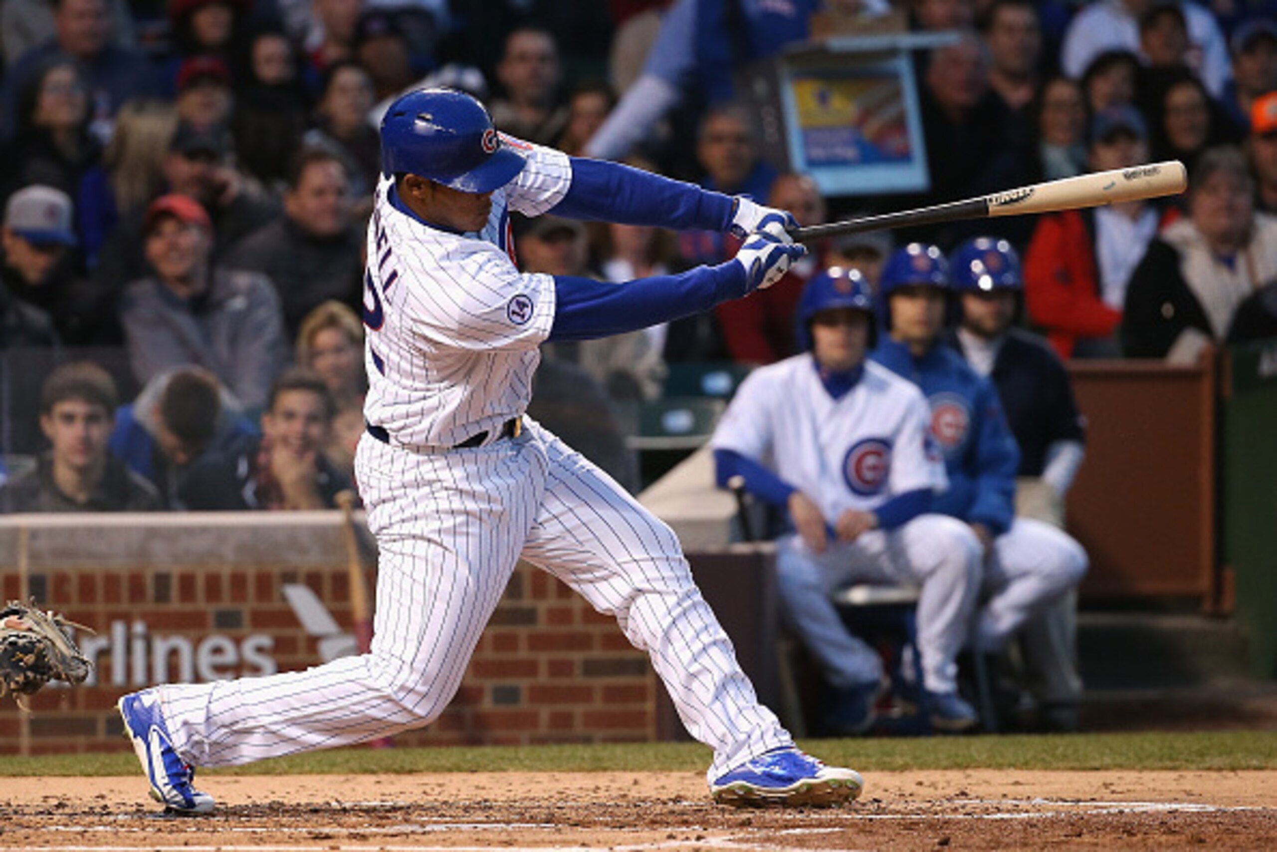 CHICAGO, IL - APRIL 28: Addison Russell #22 of the Chicago Cubs hits an hits an RBI double in the 2nd inning against the Pittsburgh Pirates at Wrigley Field on April 28, 2015 in Chicago, Illinois. (Photo by Jonathan Daniel/Getty Images)