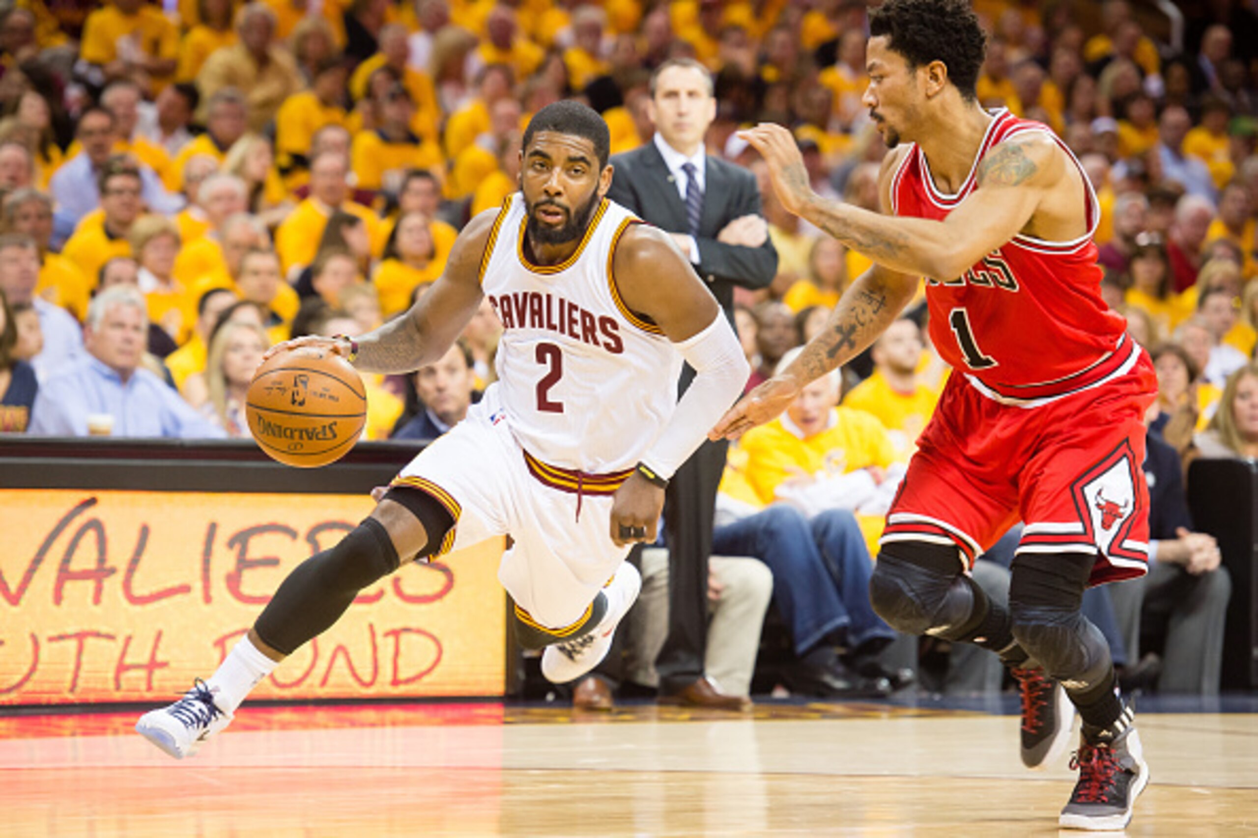 CLEVELAND, OH - MAY 4: Kyrie Irving #2 of the Cleveland Cavaliers drives against Derrick Rose #1 of the Chicago Bulls in the first half during Game One in the Eastern Conference Semifinals of the 2015 NBA Playoffs 2015 at Quicken Loans Arena on May 4, 201 CLEVELAND, OH - MAY 4: Kyrie Irving #2 of the Cleveland Cavaliers drives against Derrick Rose #1 of the Chicago Bulls in the first half during Game One in the Eastern Conference Semifinals of the 2015 NBA Playoffs 2015 at Quicken Loans Arena on May 4, 201