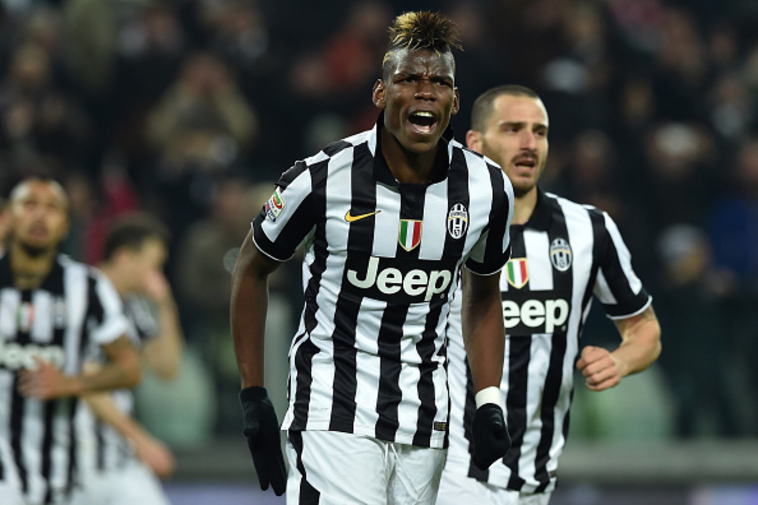TURIN, ITALY - MARCH 09:  Paul Pogba of Juventus FC celebrates after scoring the opening goal during the Serie A match between Juventus FC and US Sassuolo Calcio at Juventus Arena on March 9, 2015 in Turin, Italy.  (Photo by Valerio Pennicino/Getty Images