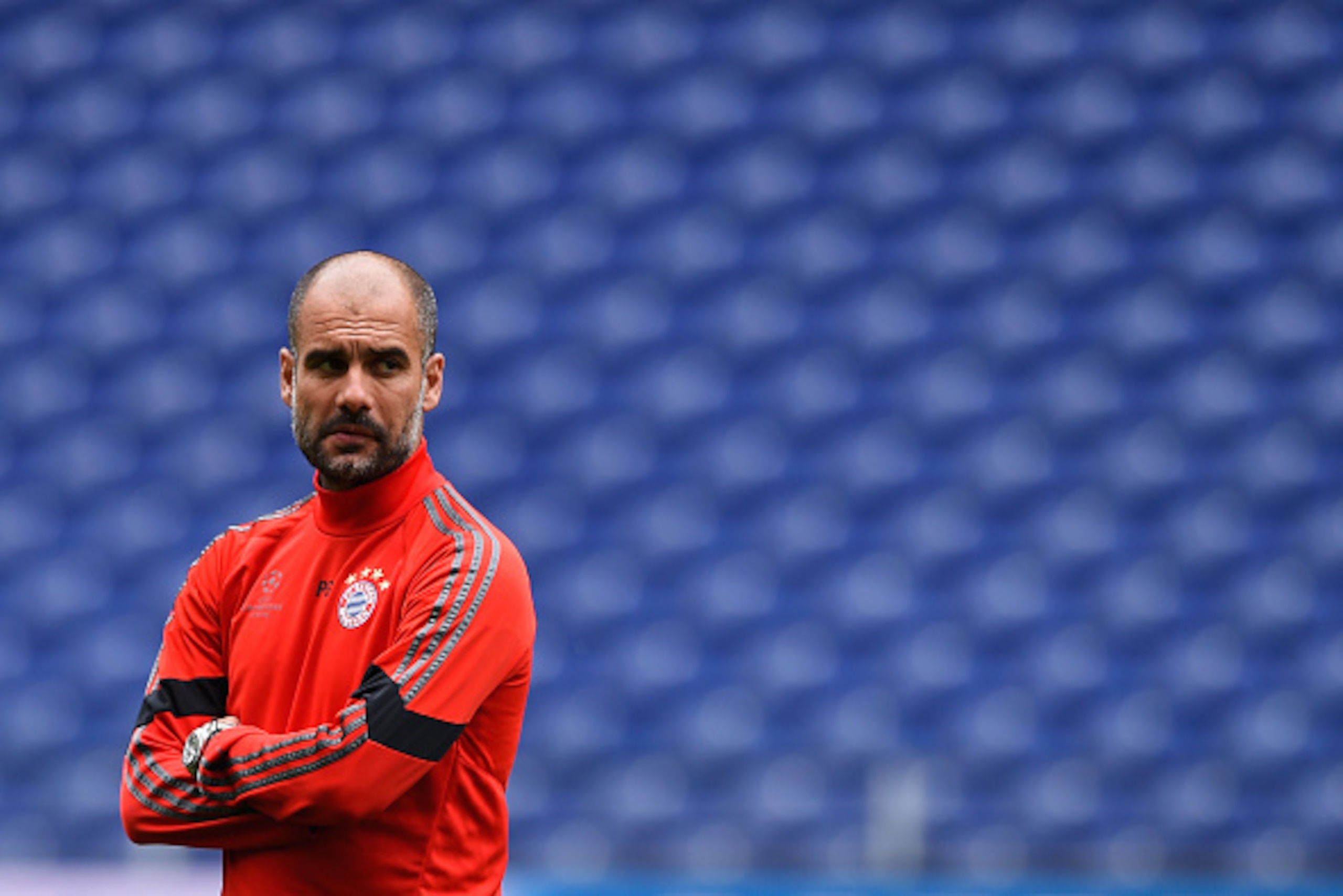 PORTO, PORTUGAL - APRIL 14:  Head coach Pep Guardiola looks on during a FC Bayern Muenchen Training Session ahead of the UEFA Champions League Quarter-Final First Leg match between Porto and FC Bayern Muenchen at Estadio do Dragao on April 14, 2015 in Por
