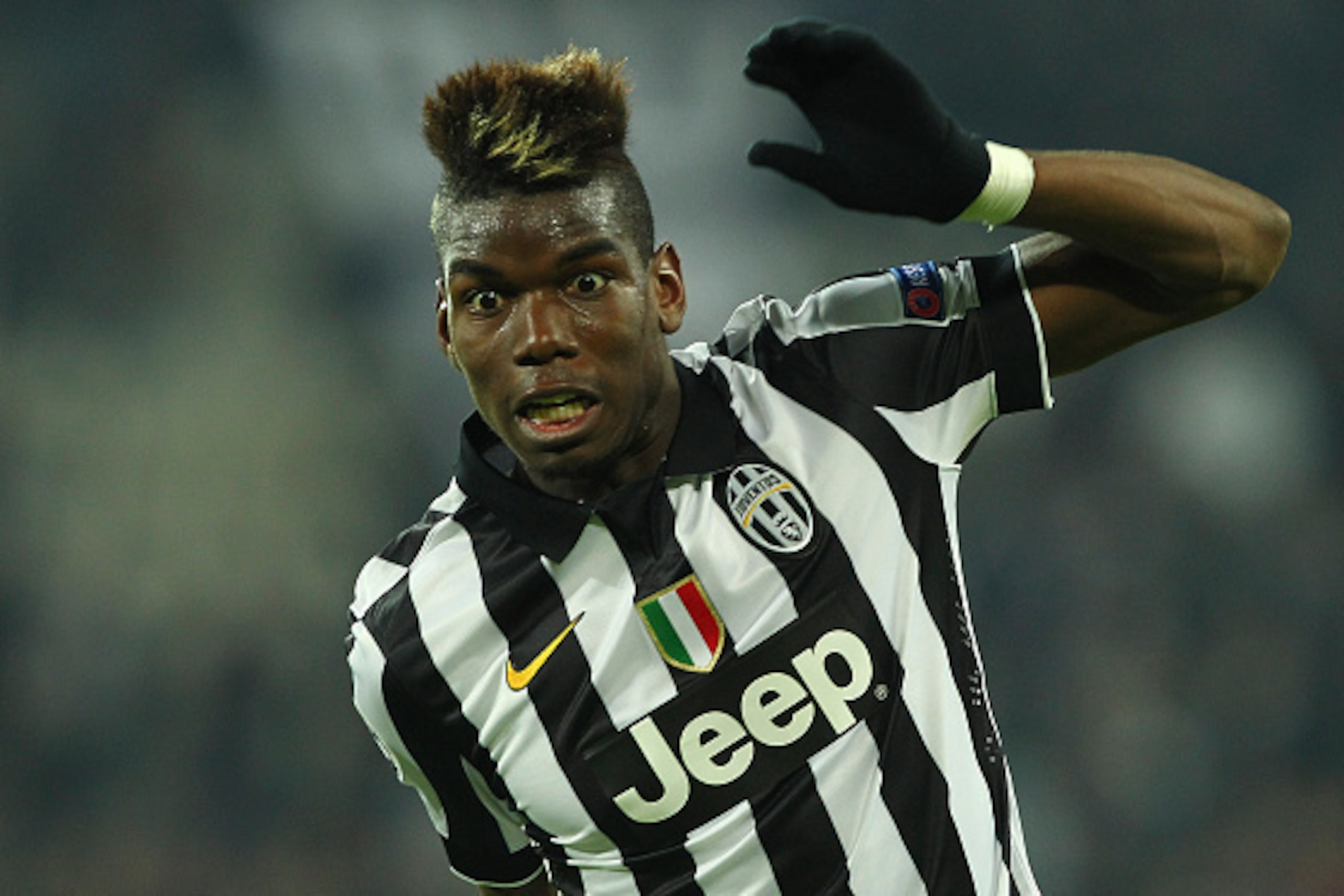 TURIN, ITALY - FEBRUARY 24:  Paul Pogba of Juventus FC in action during the UEFA Champions League Round of 16 match between Juventus and Borussia Dortmund at Juventus Arena on February 24, 2015 in Turin, Italy.  (Photo by Marco Luzzani/Getty Images)