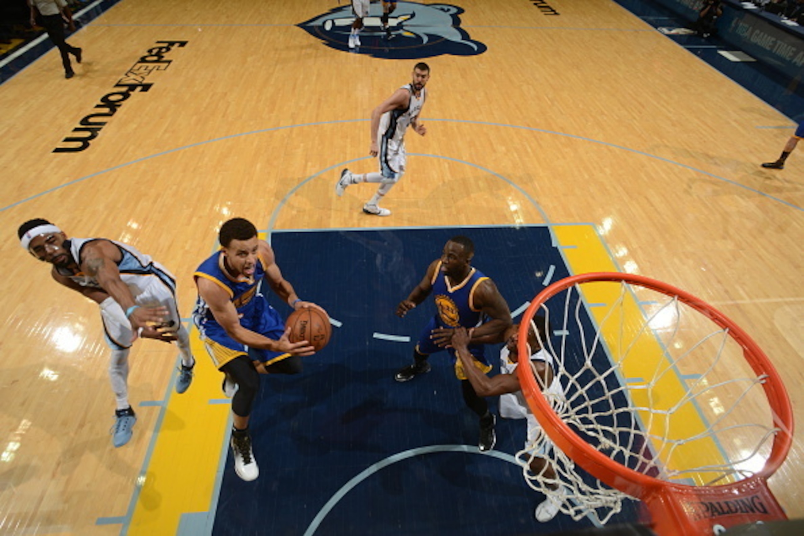 MEMPHIS, TN - MAY 9:  Stephen Curry #30 of the Golden State Warriors goes to the basket against the Memphis Grizzlies in Game Three of the Western Conference Semifinals during the 2015 NBA Playoffs on May 9, 2015 at the FedExForum in Memphis, Tennessee.  