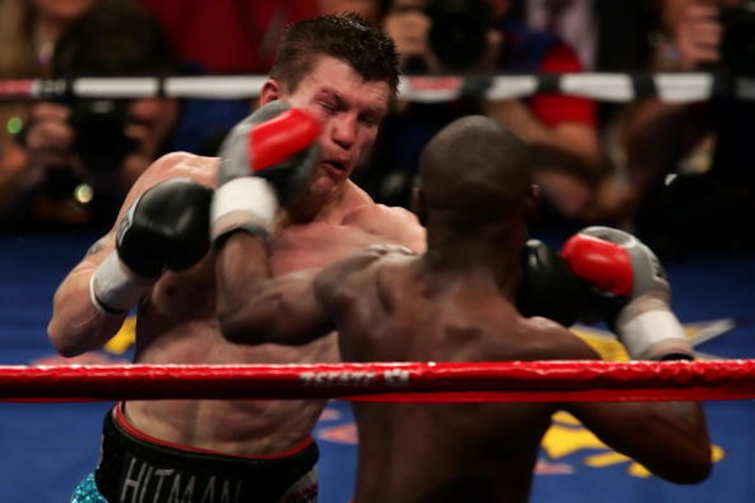LAS VEGAS - DECEMBER 08:  (R-L) Floyd Mayweather Jr. throws a left to the head of Ricky Hatton of England during their WBC world welterweight championship fight at the MGM Grand Garden Arena on December 8, 2007 in Las Vegas, Nevada.  (Photo by John Gichig
