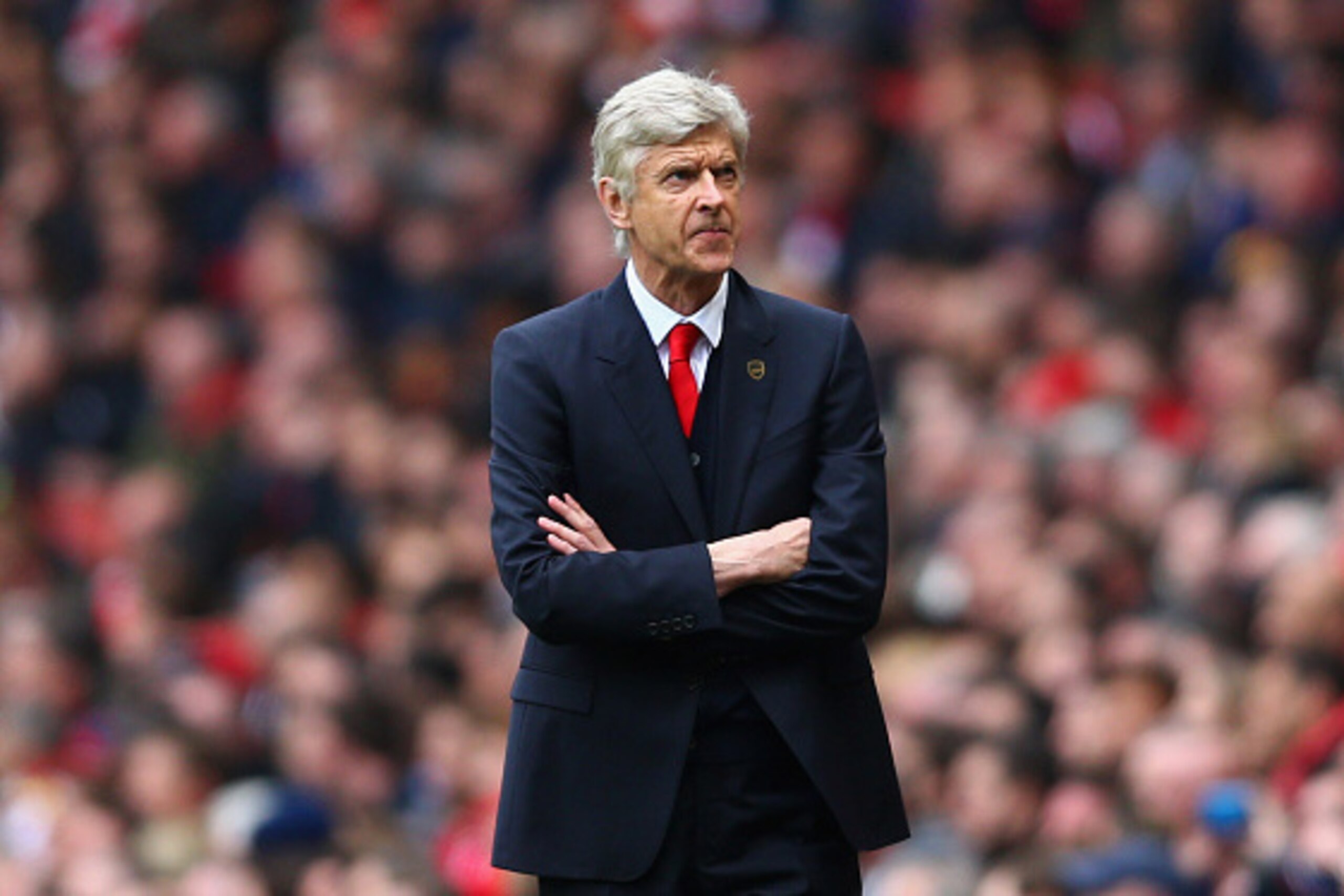 LONDON, ENGLAND - APRIL 26:  Arsene Wenger manager of Arsenal looks thoughtful during the Barclays Premier League match between Arsenal and Chelsea at Emirates Stadium on April 26, 2015 in London, England.  (Photo by Paul Gilham/Getty Images)