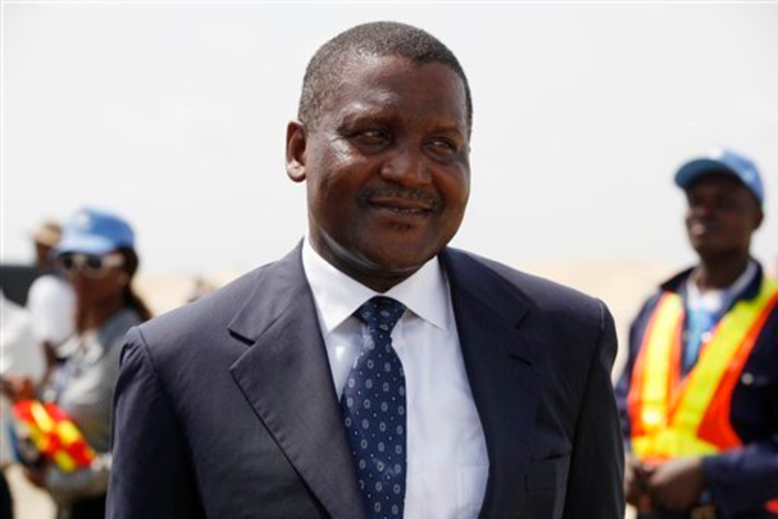 Making his money in concrete, sugar, salt and other commodities, Aliko Dangote would love to add "Arsenal" to his list.