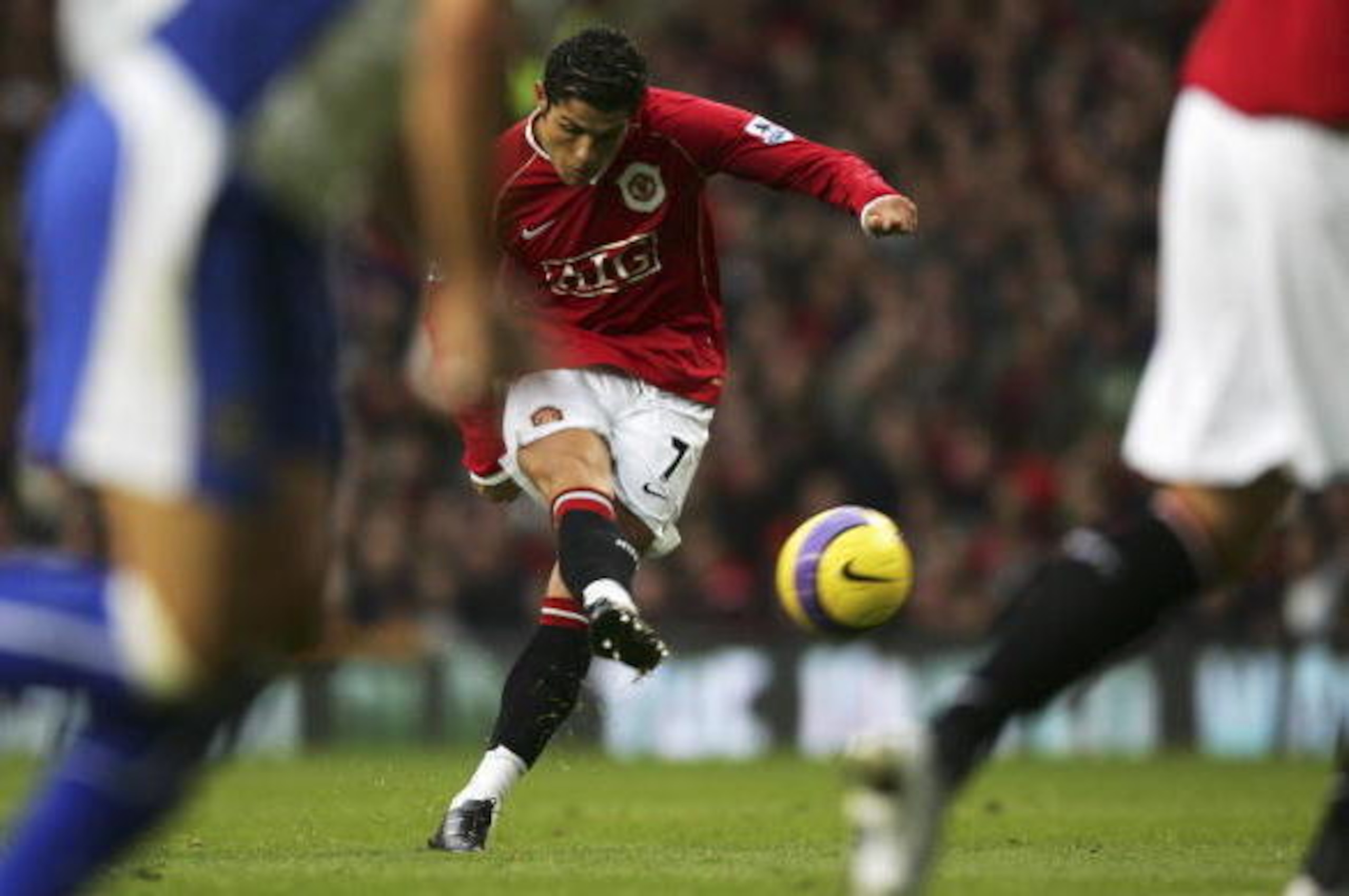 MANCHESTER, UNITED KINGDOM - NOVEMBER 04:  Cristiano Ronaldo of Manchester United  scores his team's second goal during the Barclays Premiership match between Manchester United and Portsmouth at Old Trafford on November 4, 2006 in Manchester, England.  (P