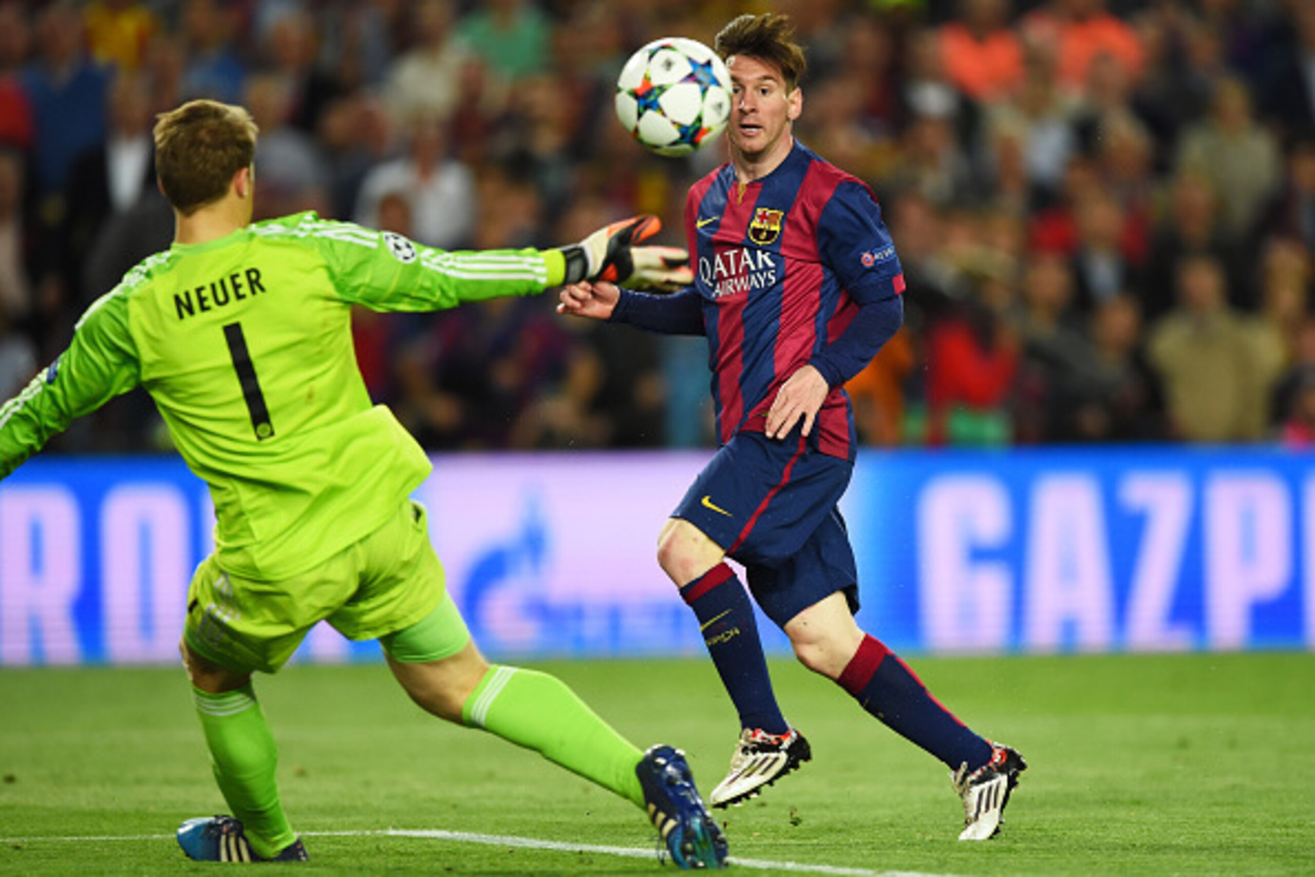 BARCELONA, SPAIN - MAY 06: Lionel Messi of Barcelona chips the ball over goalkeeper Manuel Neuer of Bayern Muenchen to score his team's second goal during the UEFA Champions League Semi Final, first leg match between FC Barcelona and FC Bayern Muenchen a BARCELONA, SPAIN - MAY 06: Lionel Messi of Barcelona chips the ball over goalkeeper Manuel Neuer of Bayern Muenchen to score his team's second goal during the UEFA Champions League Semi Final, first leg match between FC Barcelona and FC Bayern Muenchen a
