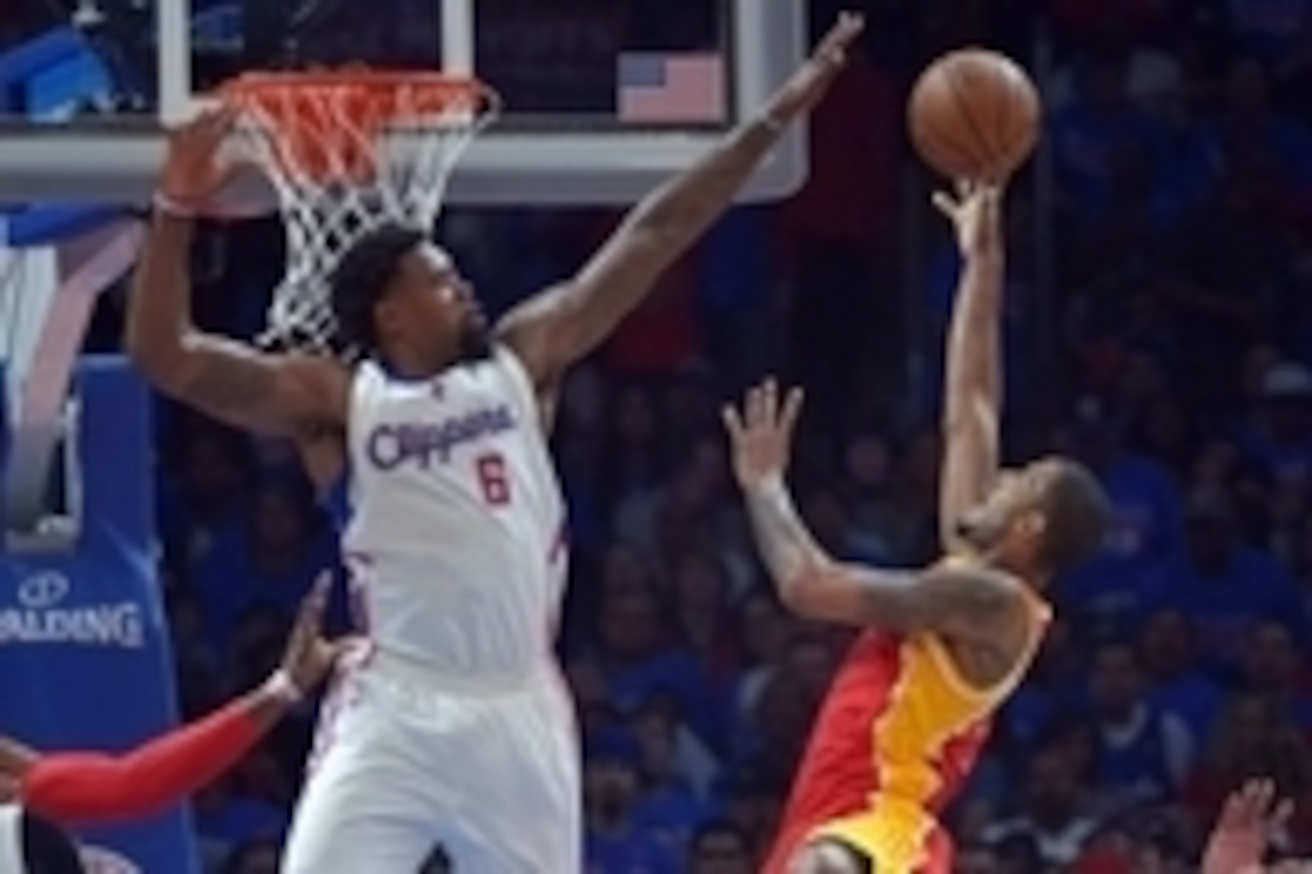 May 10, 2015; Los Angeles, CA, USA; Los Angeles Clippers center DeAndre Jordan (6) blocks a shot by Houston Rockets forward Trevor Ariza (1) in game three of the second round of the NBA Playoffs at Staples Center.  The Clippers defeated the Rockets 128-95