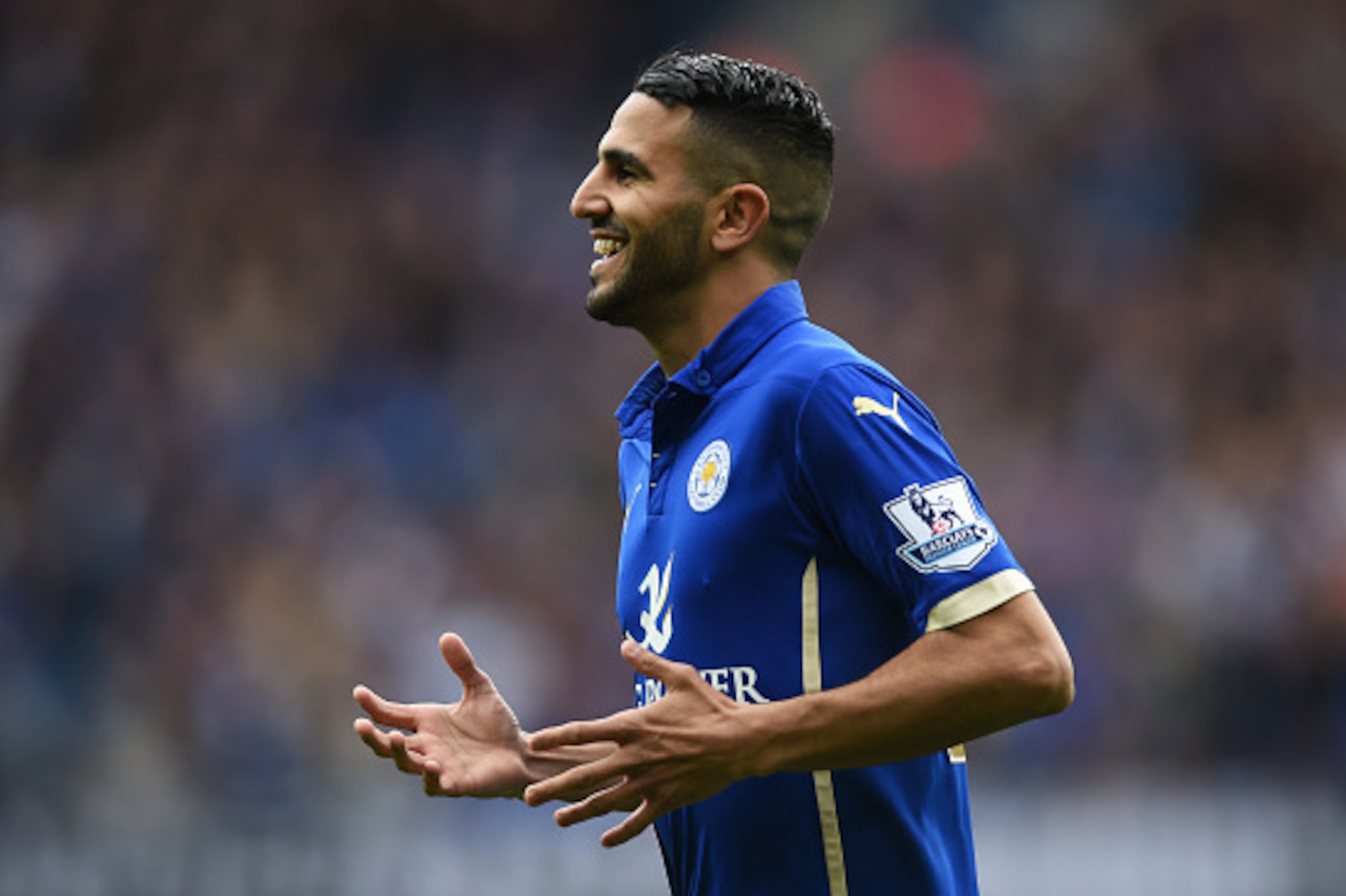LEICESTER, ENGLAND - MAY 09:  Riyad Mahrez of Leicester City celebrates scoring the second goal during the Barclays Premier League match between Leicester City and Southampton at The King Power Stadium on May 9, 2015 in Leicester, England.  (Photo by Mich
