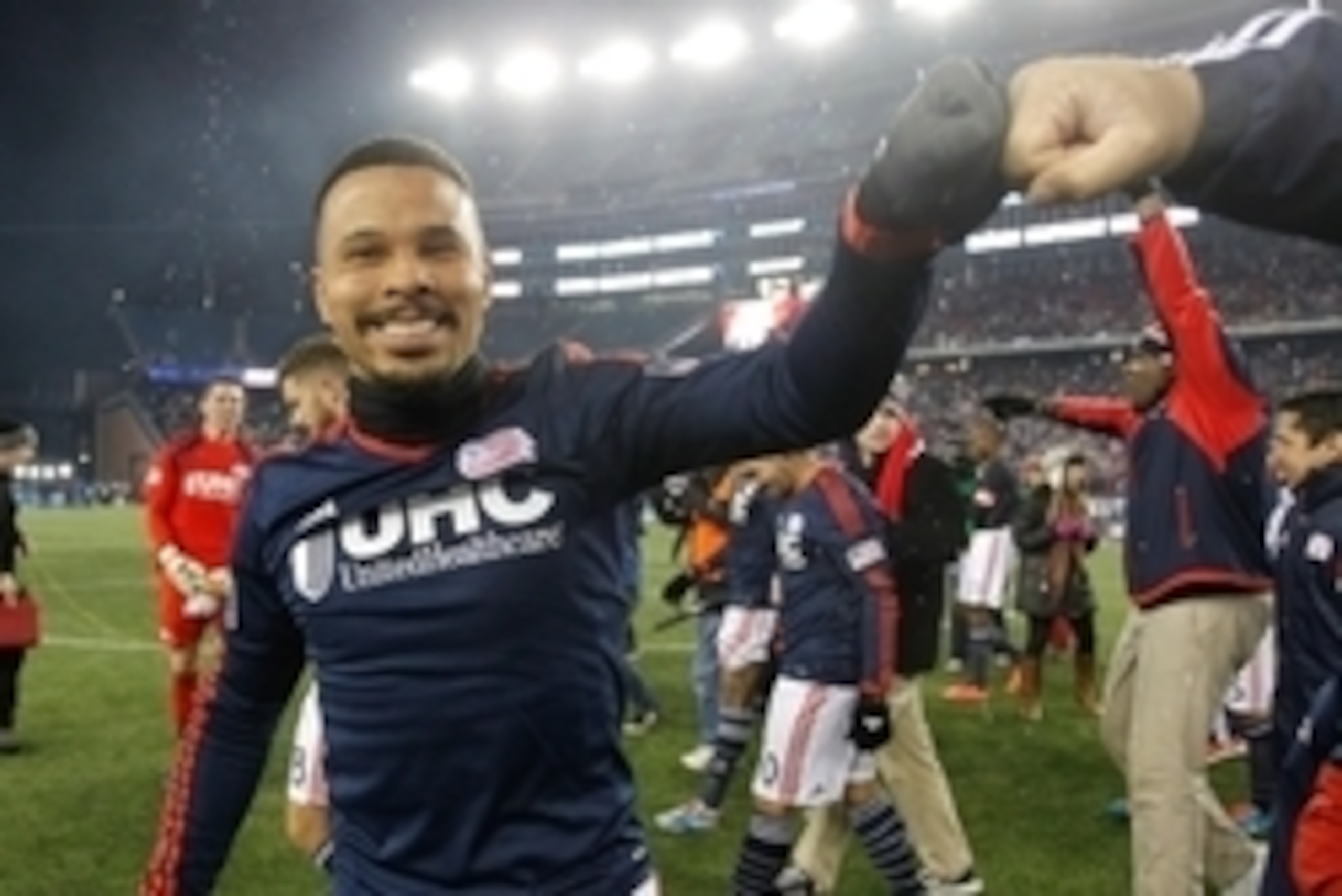 Nov 29, 2014; Foxborough, MA, USA; New England Revolution forward Charlie Davies (9) celebrates after winning the Eastern Conference Championship against the New York Red Bulls at Gillette Stadium. Mandatory Credit: Stew Milne-USA TODAY Sports