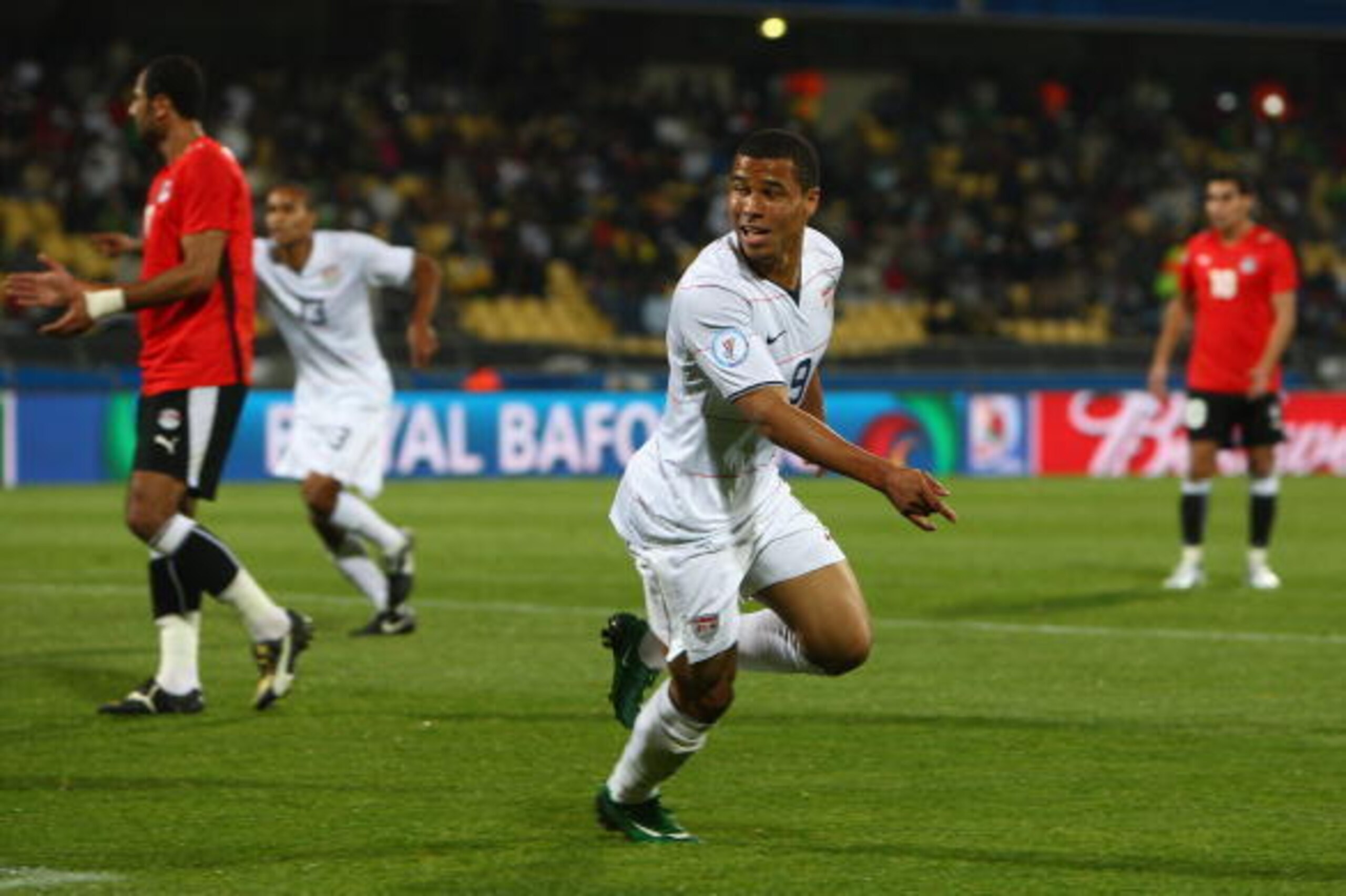 RUSTENBURG, SOUTH AFRICA - JUNE 21:  Charlie Davies of USA celebrates after scoring the opening goal during the FIFA Confederations Cup match between Egypt and USA at Royal Bafokeng Stadium on June 21, 2009 in Rustenburg, South Africa.  (Photo by Jamie Mc