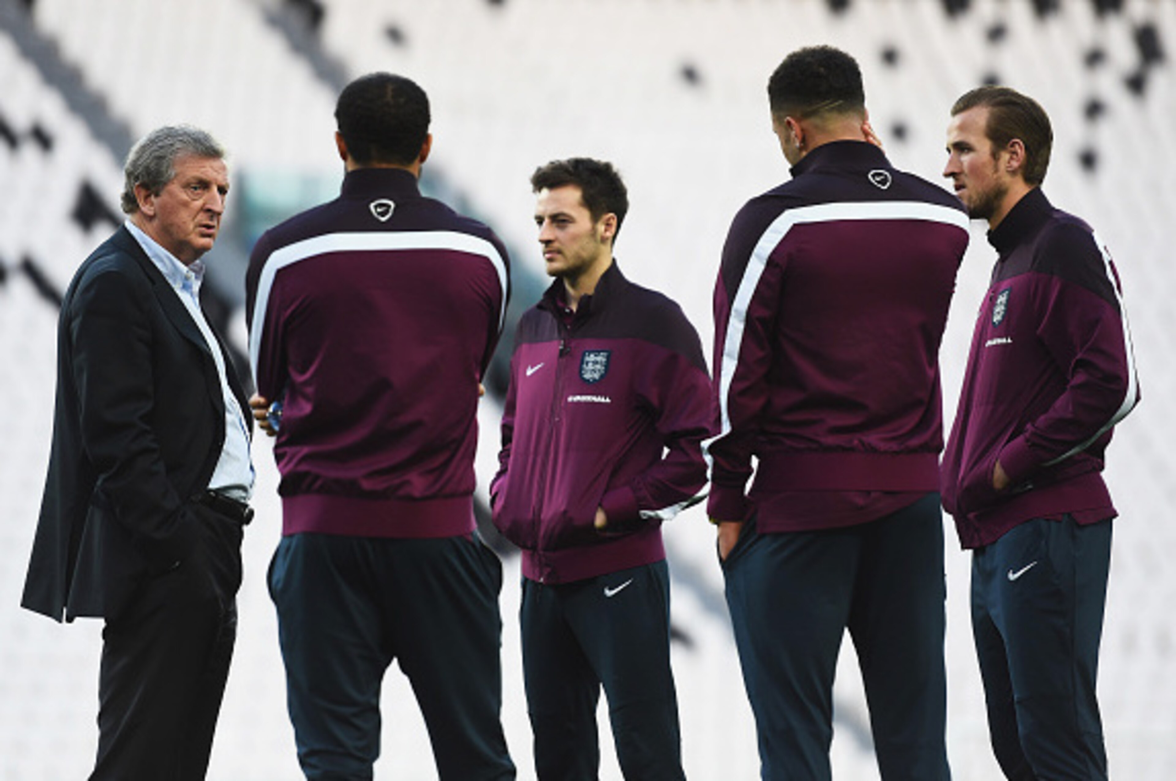 TURIN, ITALY - MARCH 30: Manager Roy Hodgson (L) of England talks to Andros Townsend, Ryan Mason, Kyle Walker and Harry Kane during an England team stadium visit ahead of the International Friendly match against Italy at Juventus Arena on March 30, 2015 TURIN, ITALY - MARCH 30: Manager Roy Hodgson (L) of England talks to Andros Townsend, Ryan Mason, Kyle Walker and Harry Kane during an England team stadium visit ahead of the International Friendly match against Italy at Juventus Arena on March 30, 2015
