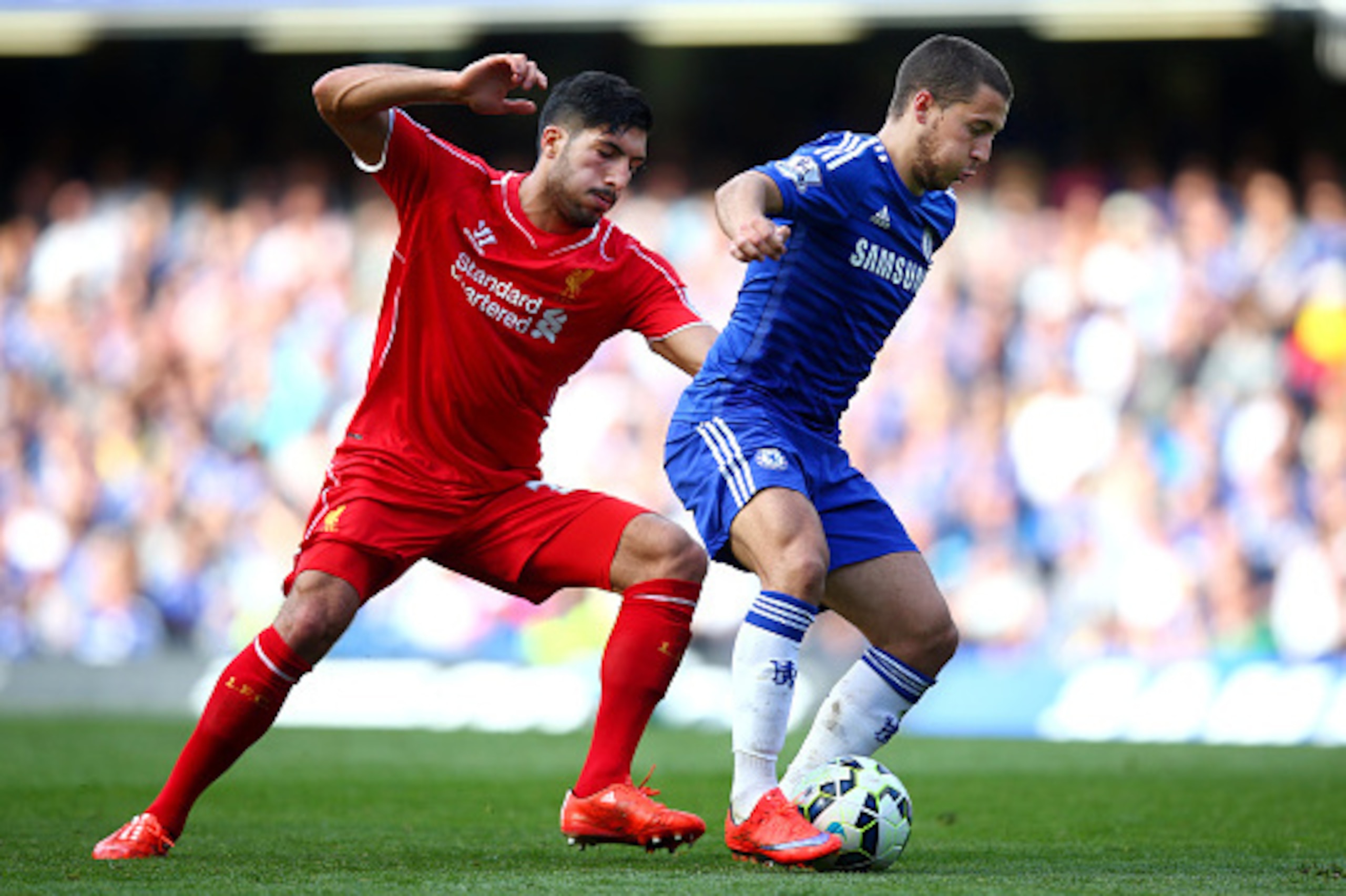 LONDON, ENGLAND - MAY 10:  Eden Hazard of Chelsea is challenged by Emre Can of Liverpool during the Barclays Premier League match between Chelsea and Liverpool at Stamford Bridge on May 10, 2015 in London, England.  (Photo by Clive Rose/Getty Images)