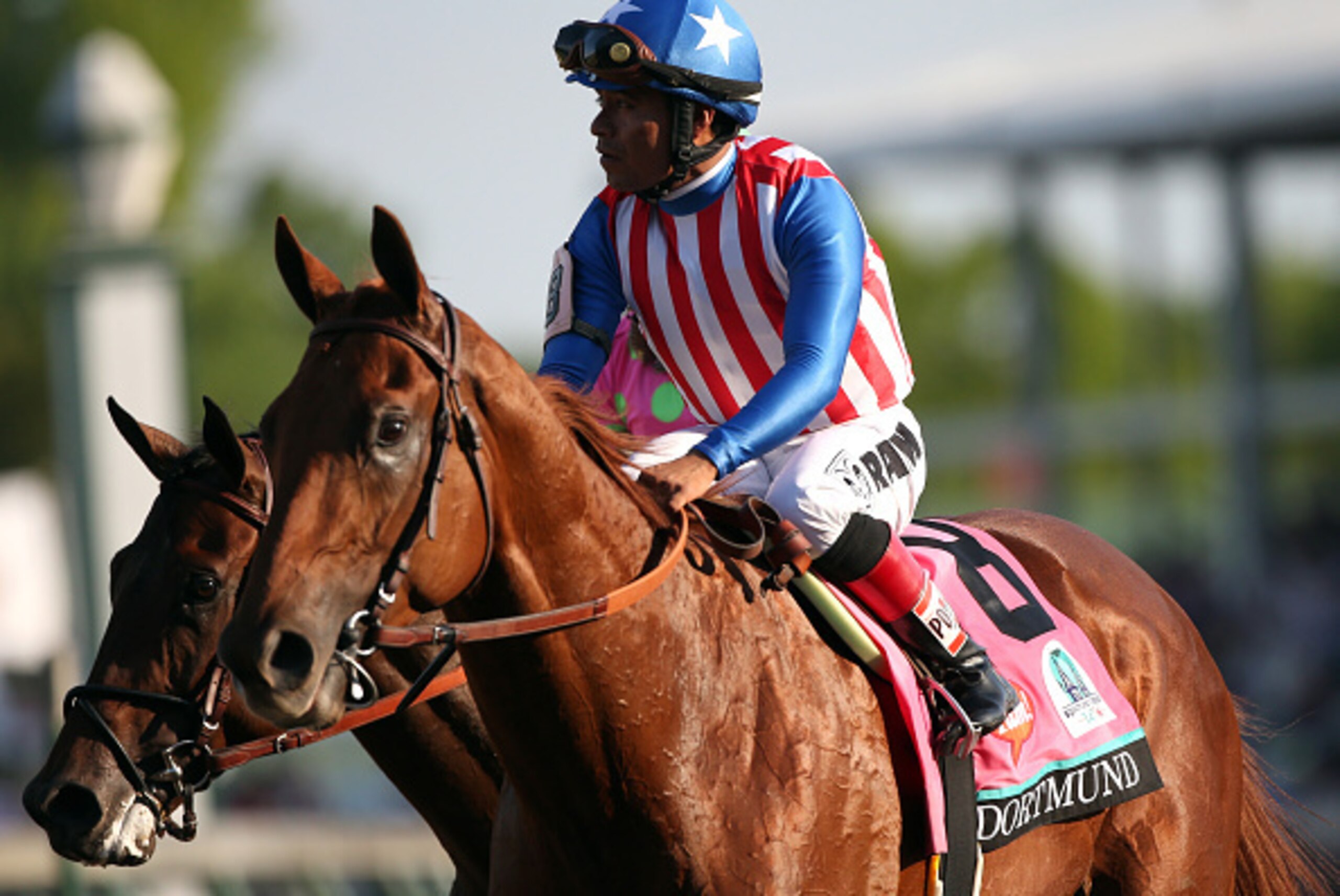 LOUISVILLE, KY - MAY 02:  Jockey Martin Garcia guides Dortmund #8 on the track after placing thrid in the 141st running of the Kentucky Derby at Churchill Downs on May 2, 2015 in Louisville, Kentucky.  (Photo by Chris Graythen/Getty Images)