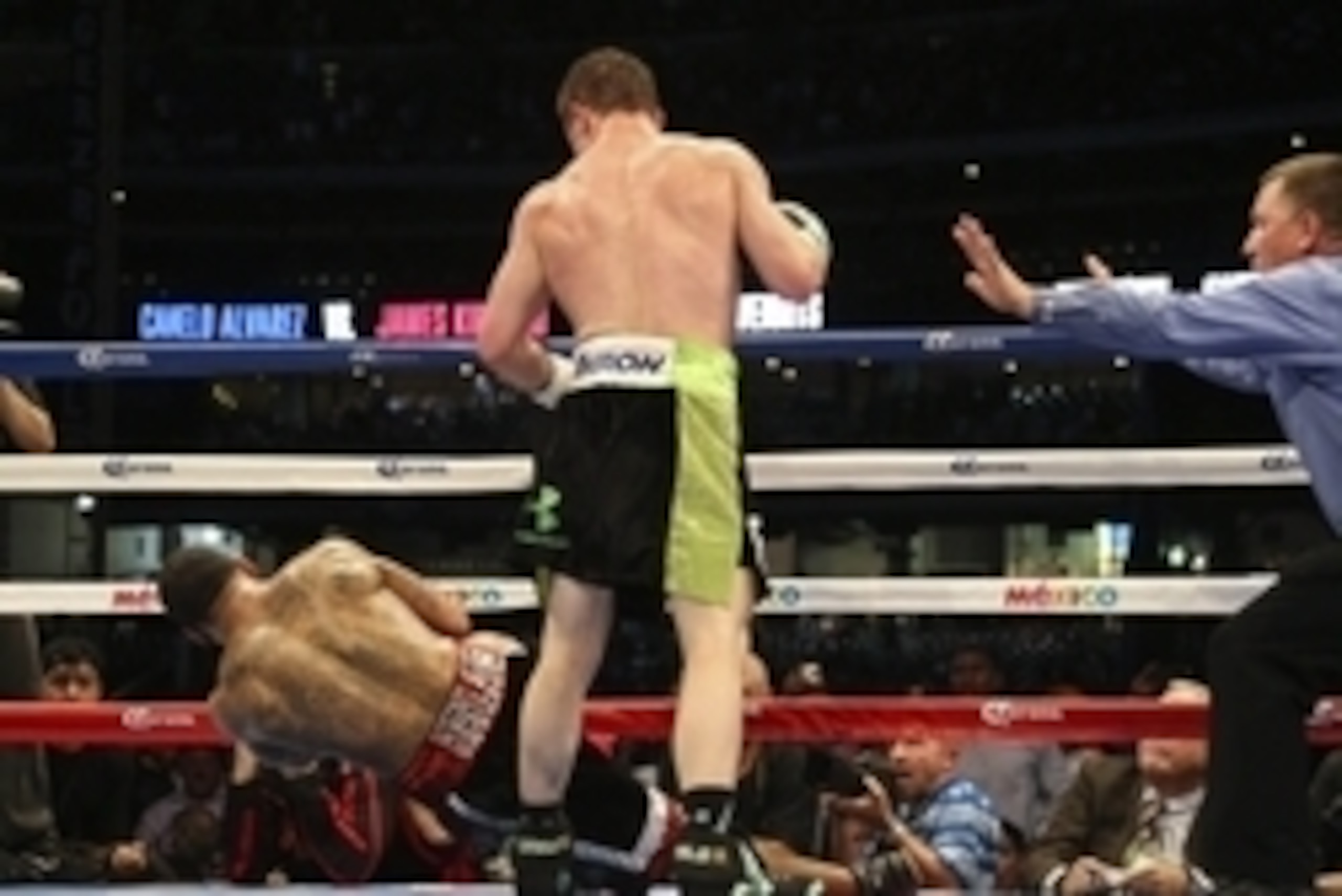 May 9, 2015; Houston, TX, USA;  Canelo Alvarez (right) knocks out James Kirkland (left) in the third round of a super welterweight fight at Minute Maid Park. Mandatory Credit: Troy Taormina-USA TODAY Sports