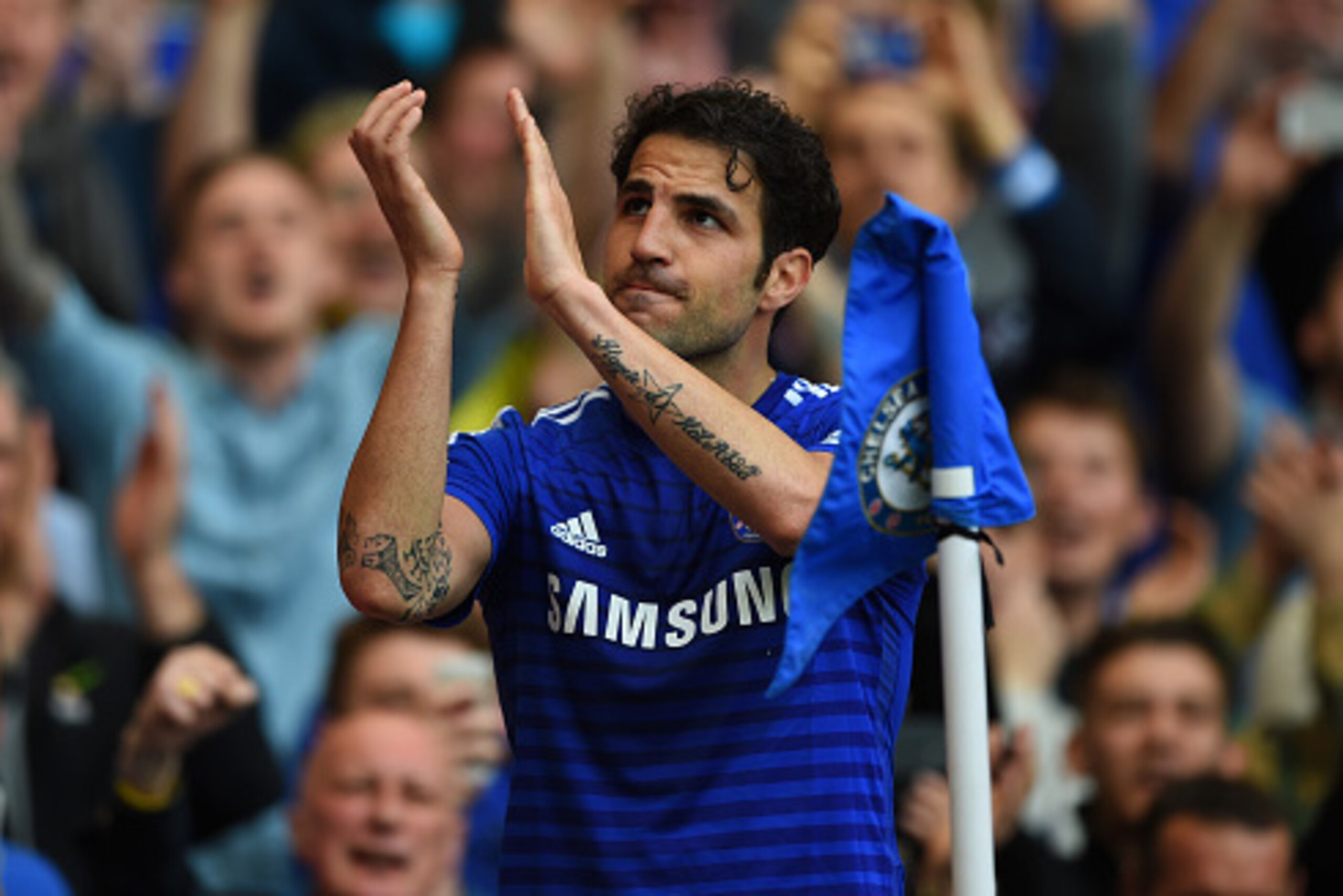 LONDON, ENGLAND - MAY 10:  Cesc Fabregas of Chelsea applauds the Chelsea fans during the Barclays Premier League match between Chelsea and Liverpool at Stamford Bridge on May 10, 2015 in London, England.  (Photo by Shaun Botterill/Getty Images)