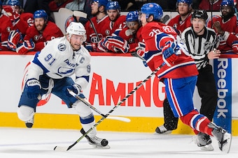 MONTREAL, QC - MAY 09:  Steven Stamkos #91 of the Tampa Bay Lightning tries to get by Jeff Petry #26 of the Montreal Canadiens in Game Five of the Eastern Conference Semifinals during the 2015 NHL Stanley Cup Playoffs at the Bell Centre on May 9, 2015 in 