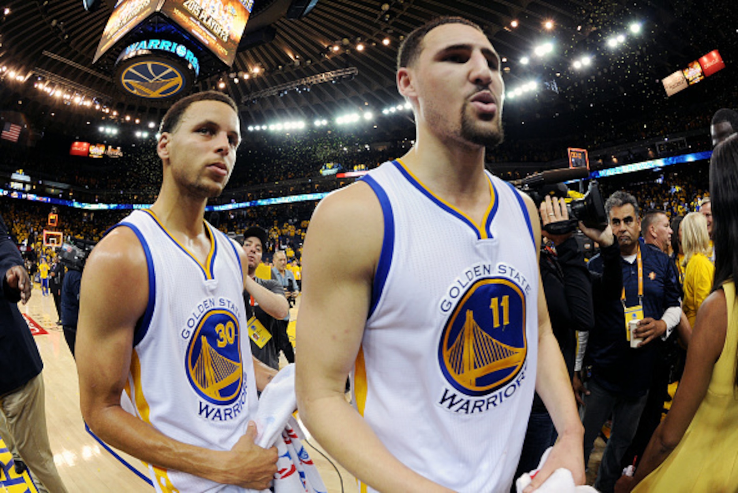 OAKLAND, CA - APRIL 20: Stephen Curry #30 and Klay Thompson #11 of the Golden State Warriors after a game against the New Orleans Pelicans in Game Two of the Western Conference Quarterfinals of the 2015 NBA Playoffs on April 20, 2015 at Oracle Arena in Oa