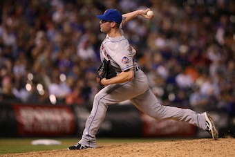 DENVER, CO - MAY 03:  Relief pitcher Kyle Farnsworth #44 of the New York Mets works against the Colorado Rockies in the ninth inning at Coors Field on May 3, 2014 in Denver, Colorado. Farnsworth collected the loss as he up the game winning walk off two ru