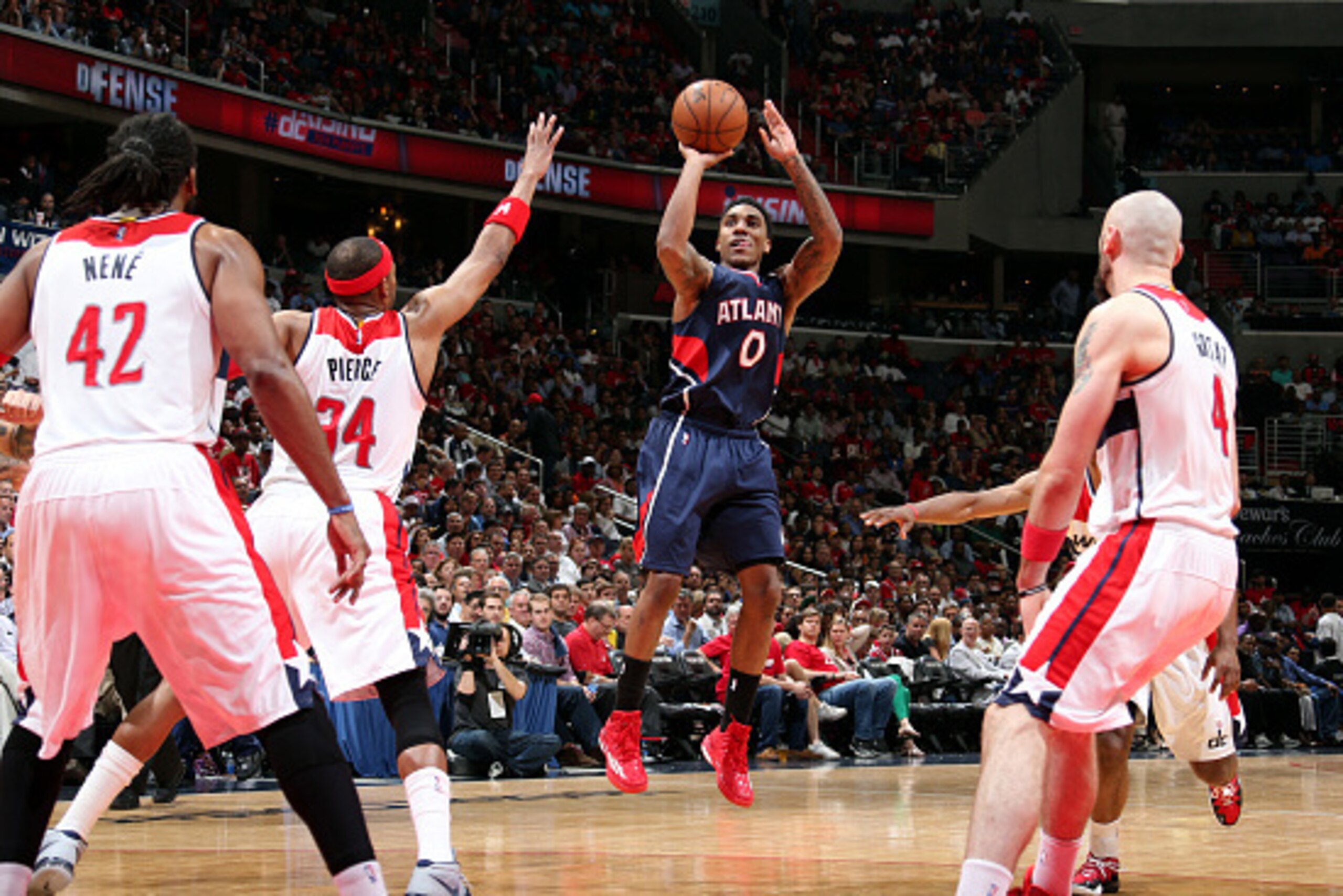 WASHINGTON, DC - MAY 11: Jeff Teague #0 of the Atlanta Hawks shoots against the Washington Wizards in Game Four of the Eastern Conference Semifinals of the 2015 NBA Playoffs at the Verizon Center on May 11, 2015 in Washington, DC. NOTE TO USER: User expre