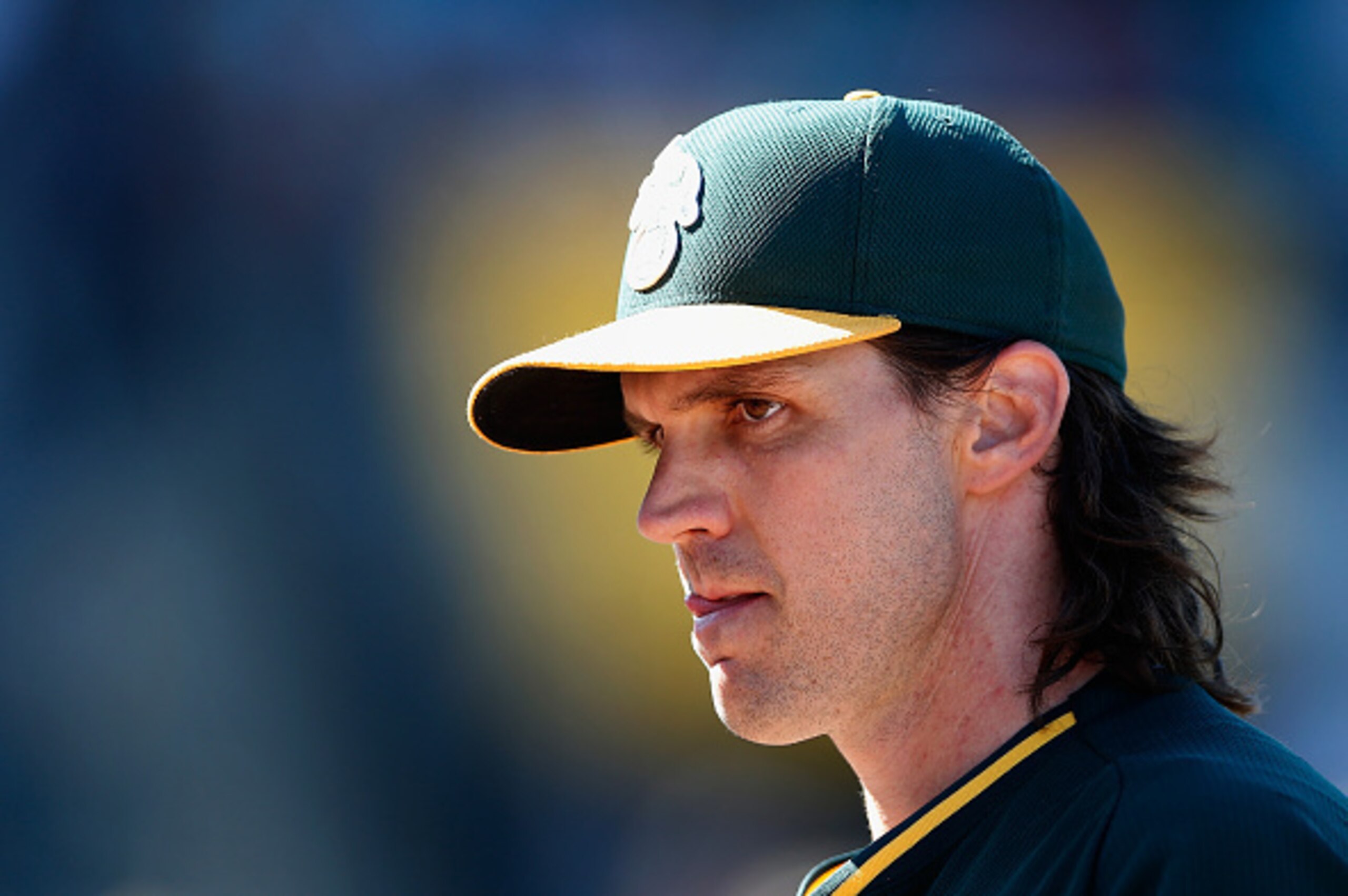 MESA, AZ - MARCH 10:  Pitcher Barry Zito #75 of the Oakland Athletics walks to the dugout during the spring training game against the Arizona Diamondbacks at HoHoKam Stadium on March 10, 2015 in Mesa, Arizona.  (Photo by Christian Petersen/Getty Images)