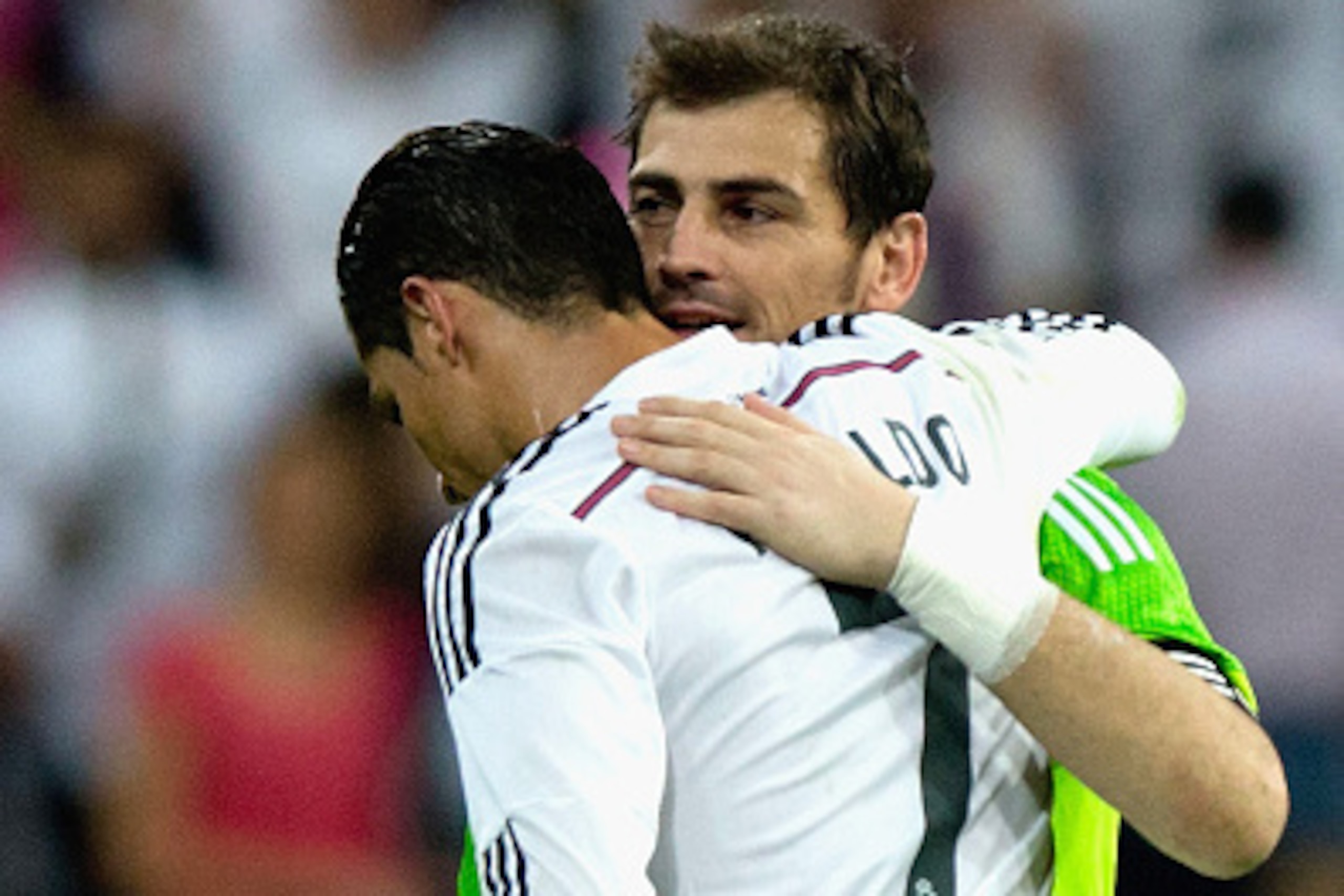 MADRID, SPAIN - OCTOBER 25: Iker Casillas of Real Madrid CF hugs Cristiano Ronaldo of Real Madrid CF during the La Liga match between Real Madrid CF and FC Barcelona at Estadio Santiago Bernabeu on October 25, 2014 in Madrid, Spain. (Photo by Gonzalo Ar MADRID, SPAIN - OCTOBER 25: Iker Casillas of Real Madrid CF hugs Cristiano Ronaldo of Real Madrid CF during the La Liga match between Real Madrid CF and FC Barcelona at Estadio Santiago Bernabeu on October 25, 2014 in Madrid, Spain. (Photo by Gonzalo Ar