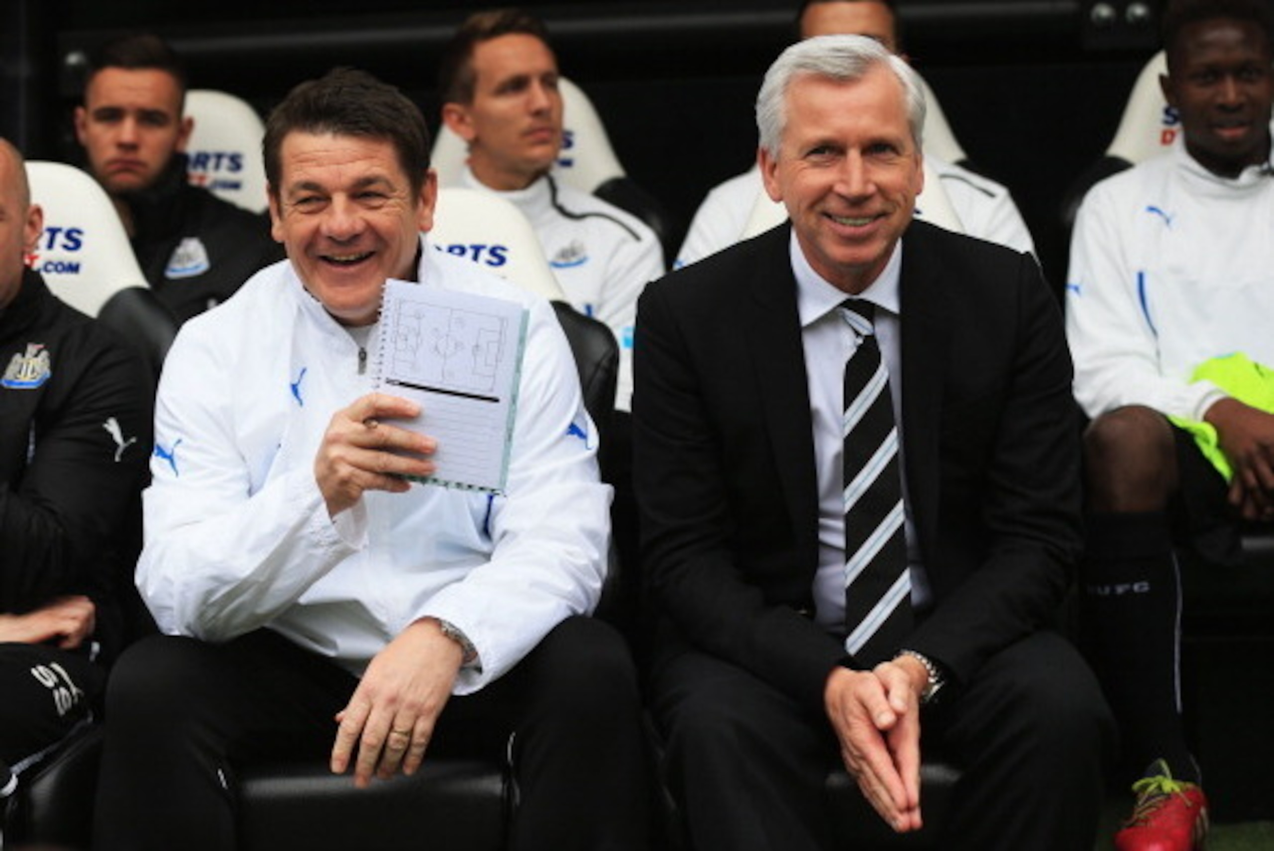 NEWCASTLE UPON TYNE, ENGLAND - MAY 03:  Alan Pardew manager of Newcastle United and assistant John Carver look on from the bench prior to during the Barclays Premier League match between Newcastle United and Cardiff City at St James' Park on May 3, 2014 i