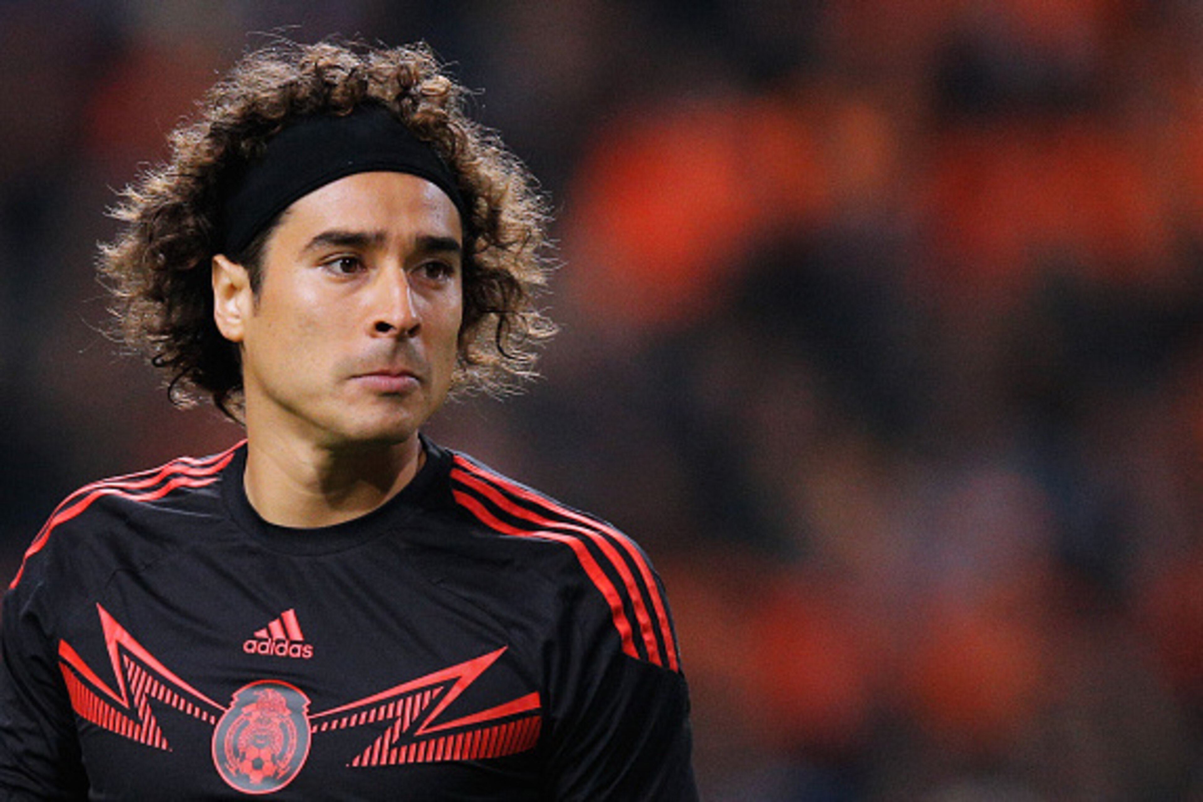 AMSTERDAM, NETHERLANDS - NOVEMBER 12:  Goalkeeper, Guillermo Ochoa of Mexico looks ot the ball during the international friendly match between Netherlands and Mexico held at the Amsterdam ArenA on November 12, 2014 in Amsterdam, Netherlands.  (Photo by De