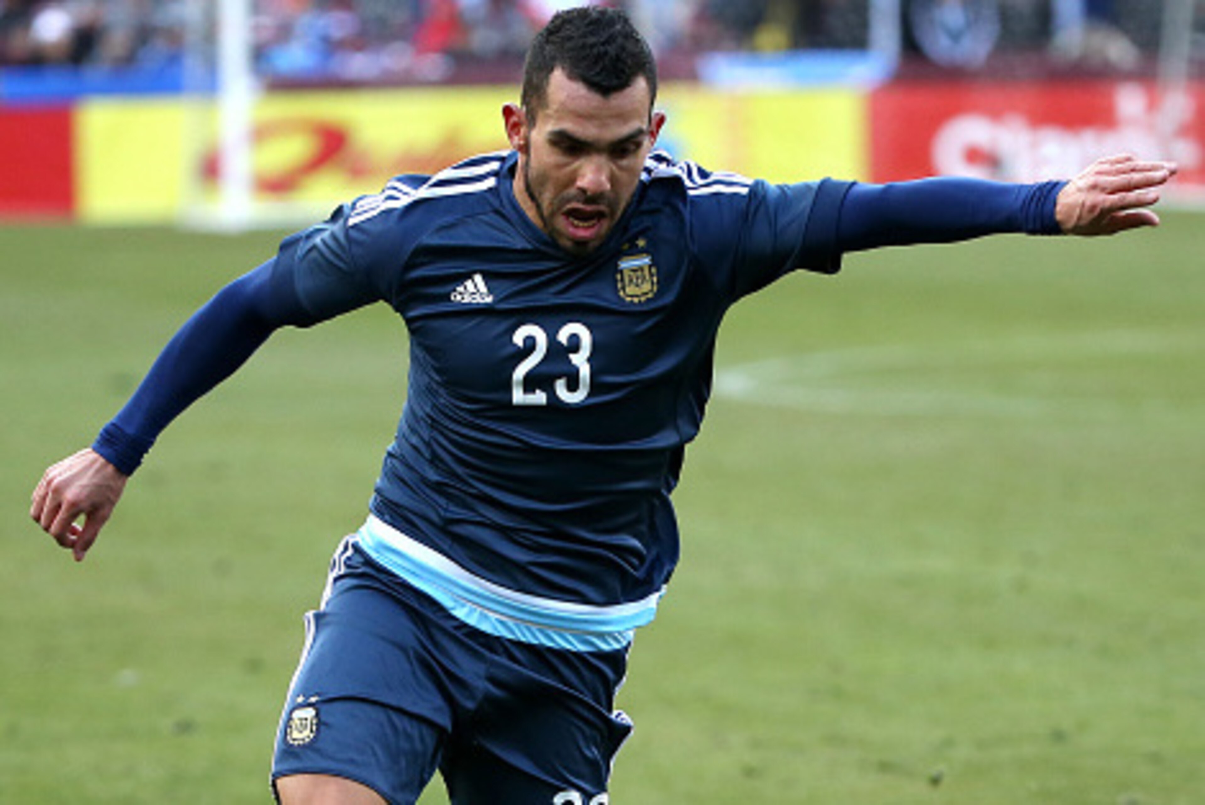 LANDOVER, MD - MARCH 28: Carlos Tevez #23 of Argentina in action against El Salvador during an International Friendly at FedExField on March 28, 2015 in Landover, Maryland. Argentina won, 2-0. (Photo by Patrick Smith/Getty Images)