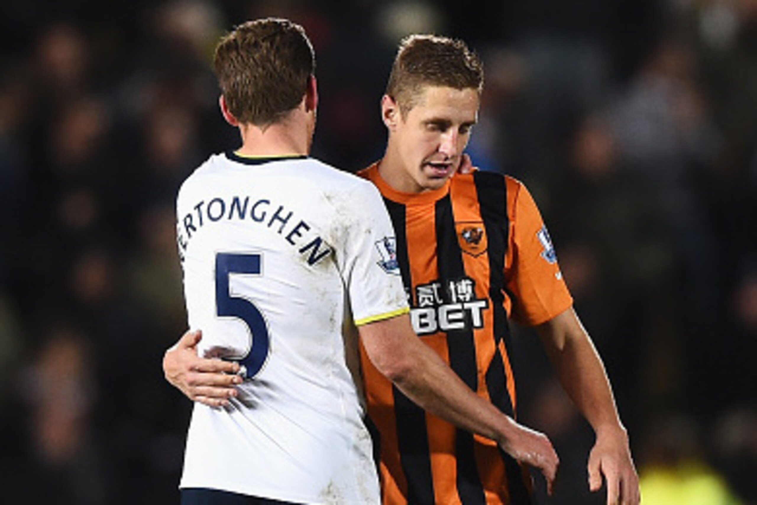 HULL, ENGLAND - NOVEMBER 23: Michael Dawson of Hull City is consoled by Jan Vertonghen of Tottenham Hotspur after the Barclays Premier League match between Hull City and Tottenham Hotspur at KC Stadium on November 23, 2014 in Hull, England.  (Photo by Lau